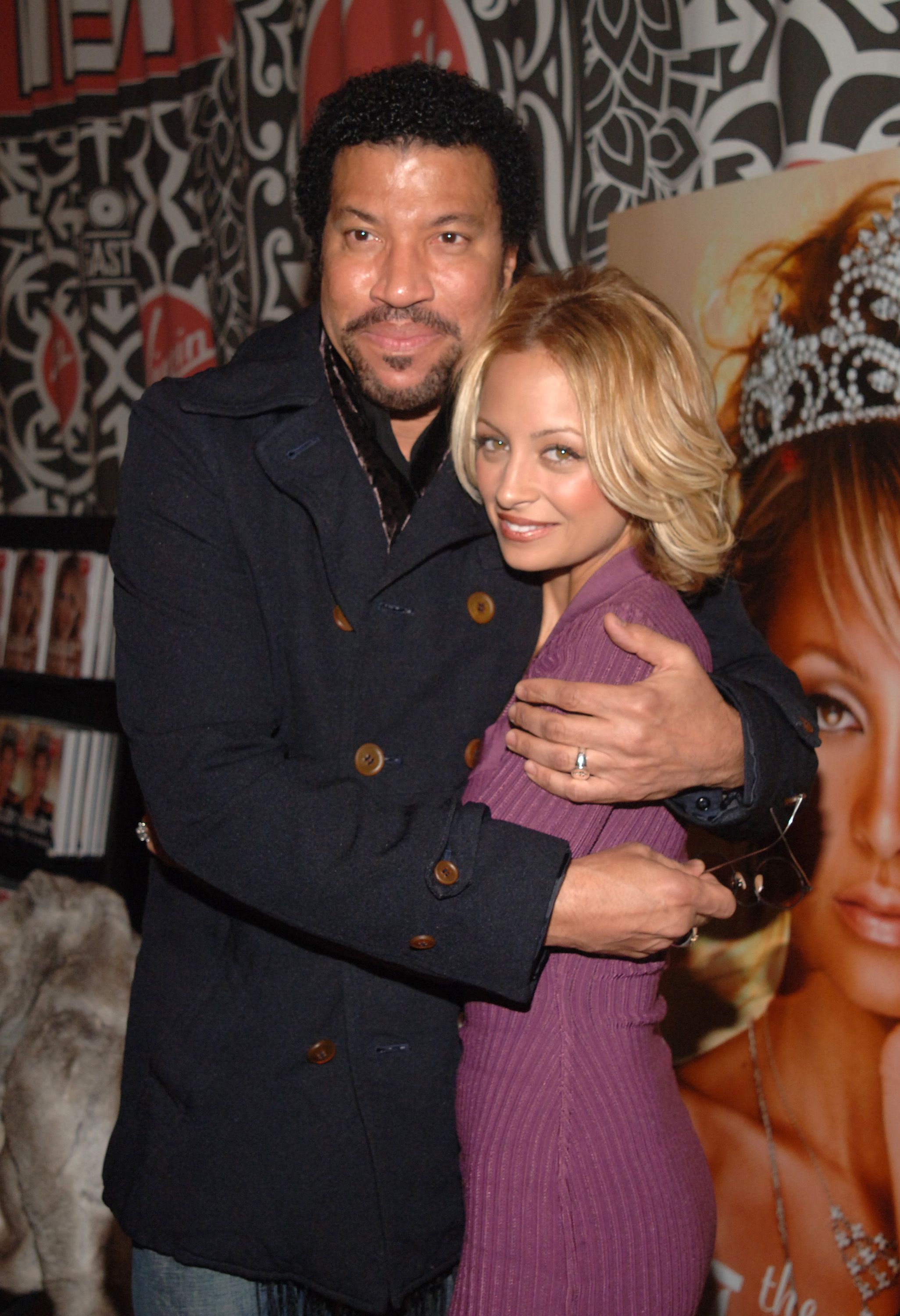 Lionel and Nicole Richie at the "The Truth About Diamonds" book signing at the Virgin Mega Store in Times Square on November 10, 2005, in New York City | Photo: Brad Barket/Getty Images