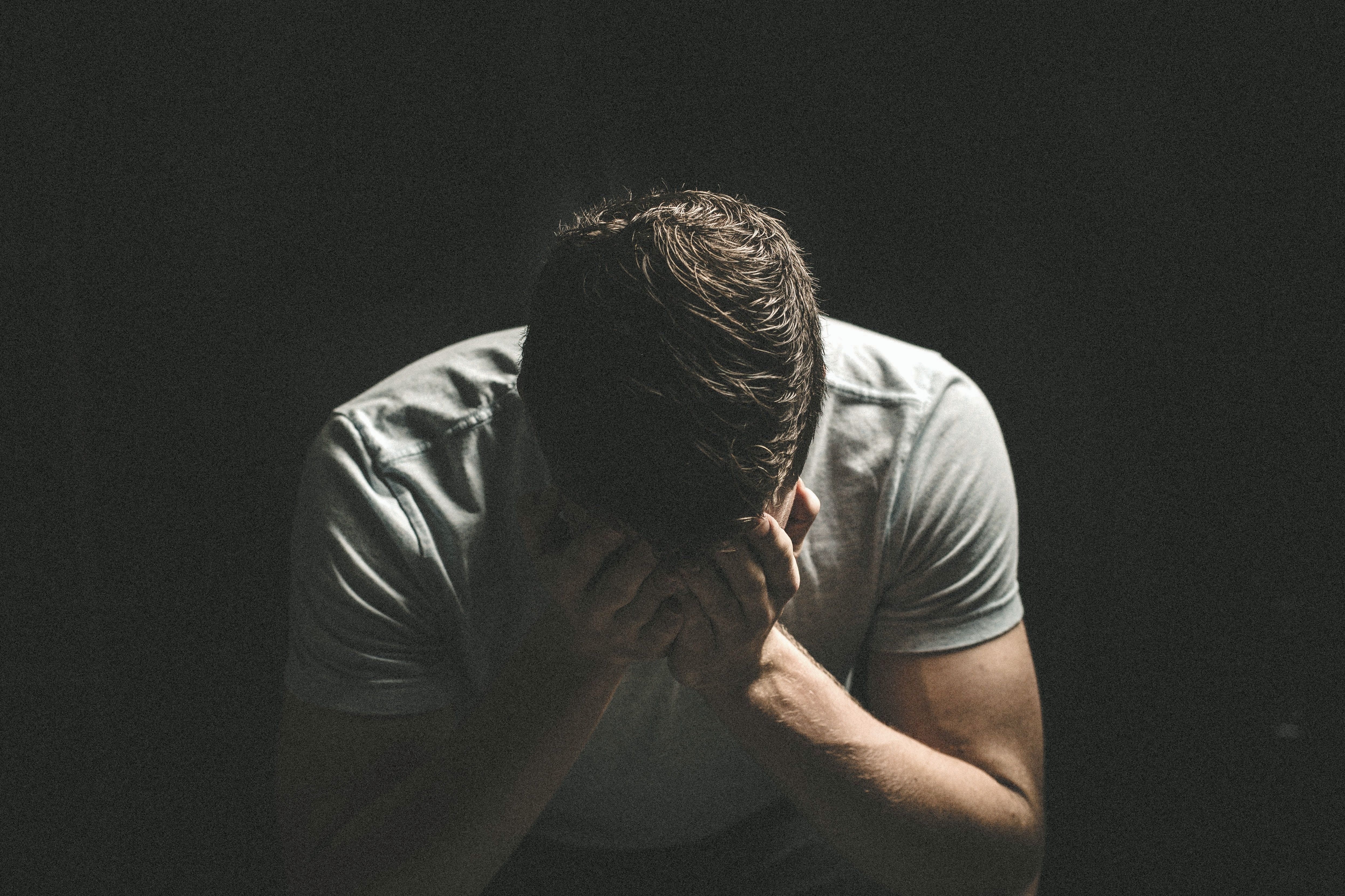 Despair, man holding his head | Source: Shutterstock