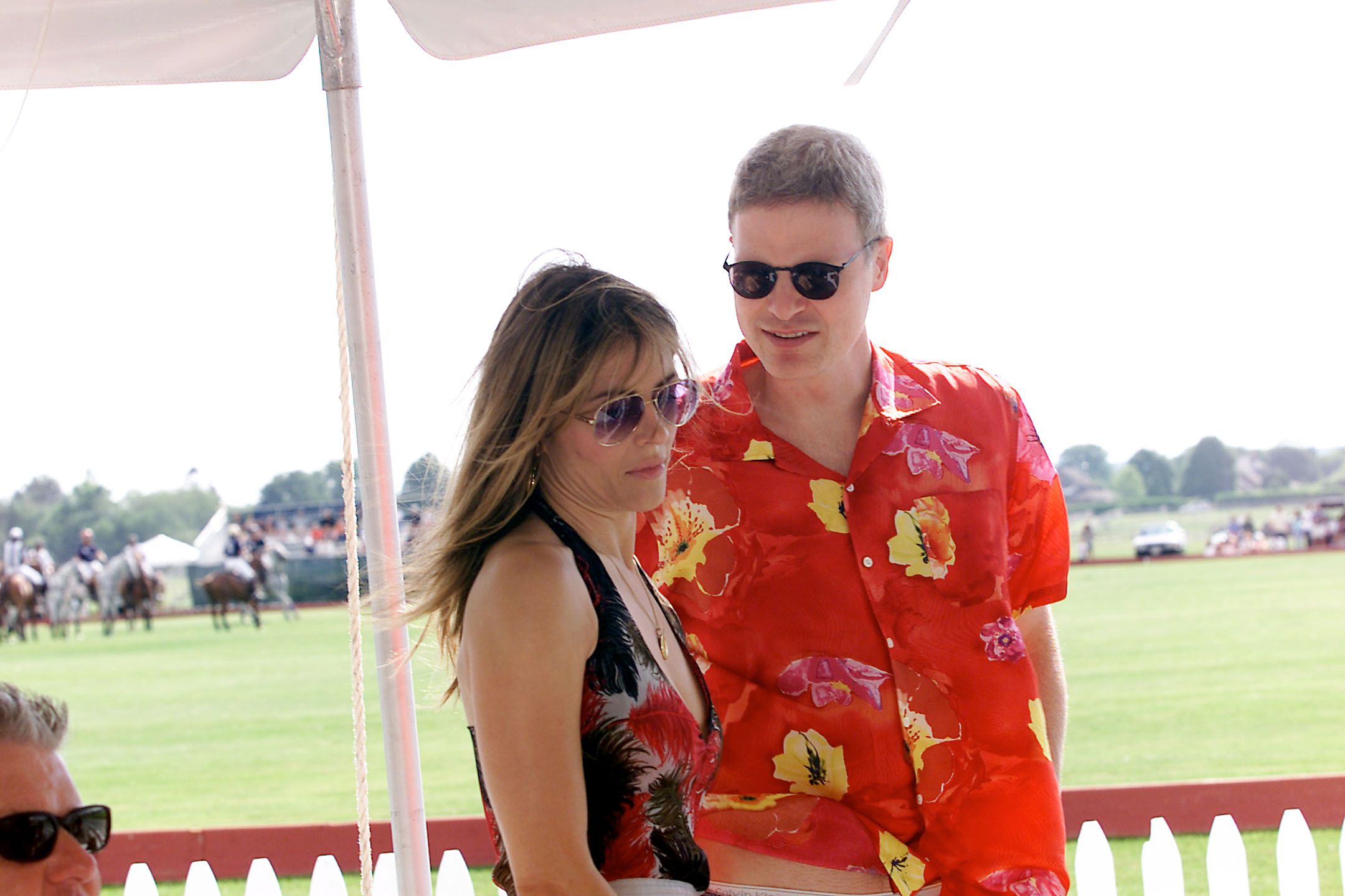 Elizabeth Hurley and Steven Bing at opening day at the Mercedes-Benz Polo Challenge at the Bridgehampton Polo Club in Bridgehampton, New York, June 14, 2001. | Source: Getty Images