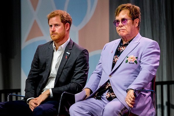  Sir Elton John and Prince Harry, Duke of Sussex at the  International AIDS Conference on July 24, 2018 in Amsterdam, Netherlands.| Photo:Getty Images