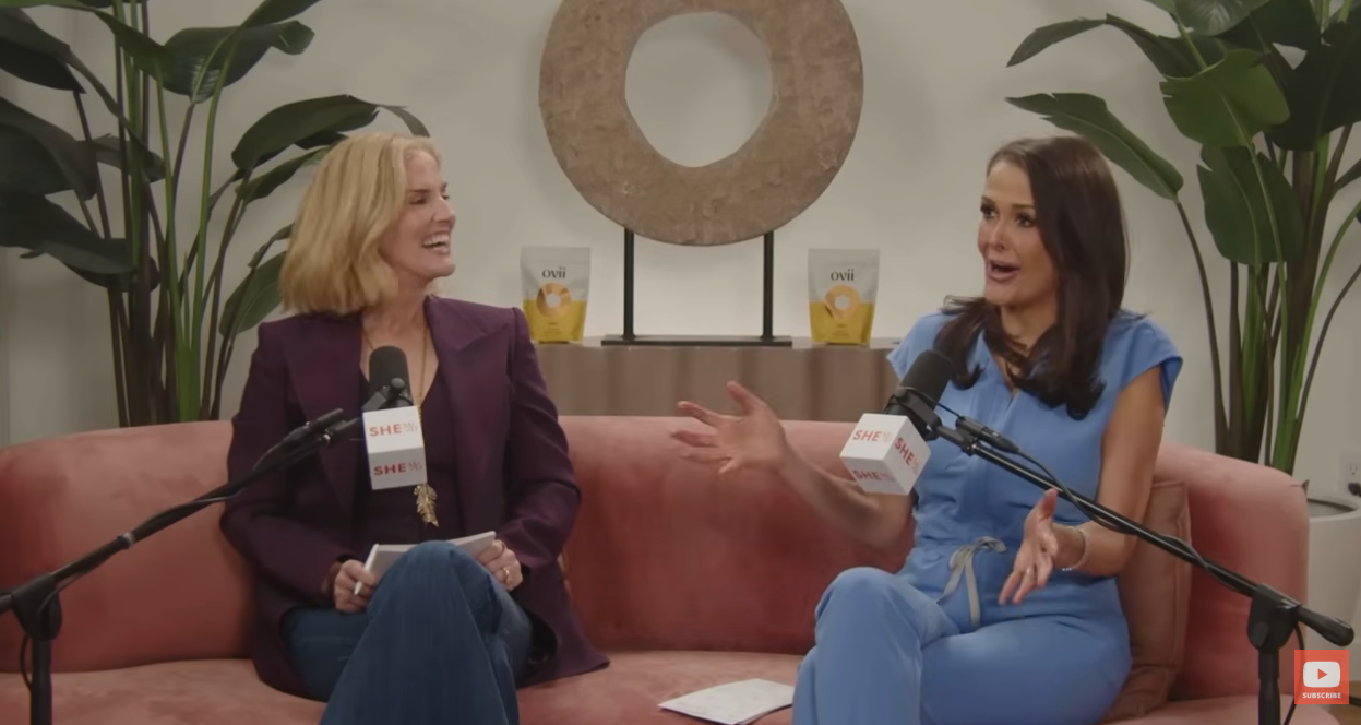 Mary Alice Haney looks on as Dr. Thaïs Aliabadi reacts during the "She MD" podcast episode | Source: YouTube/SHEMDPodcast