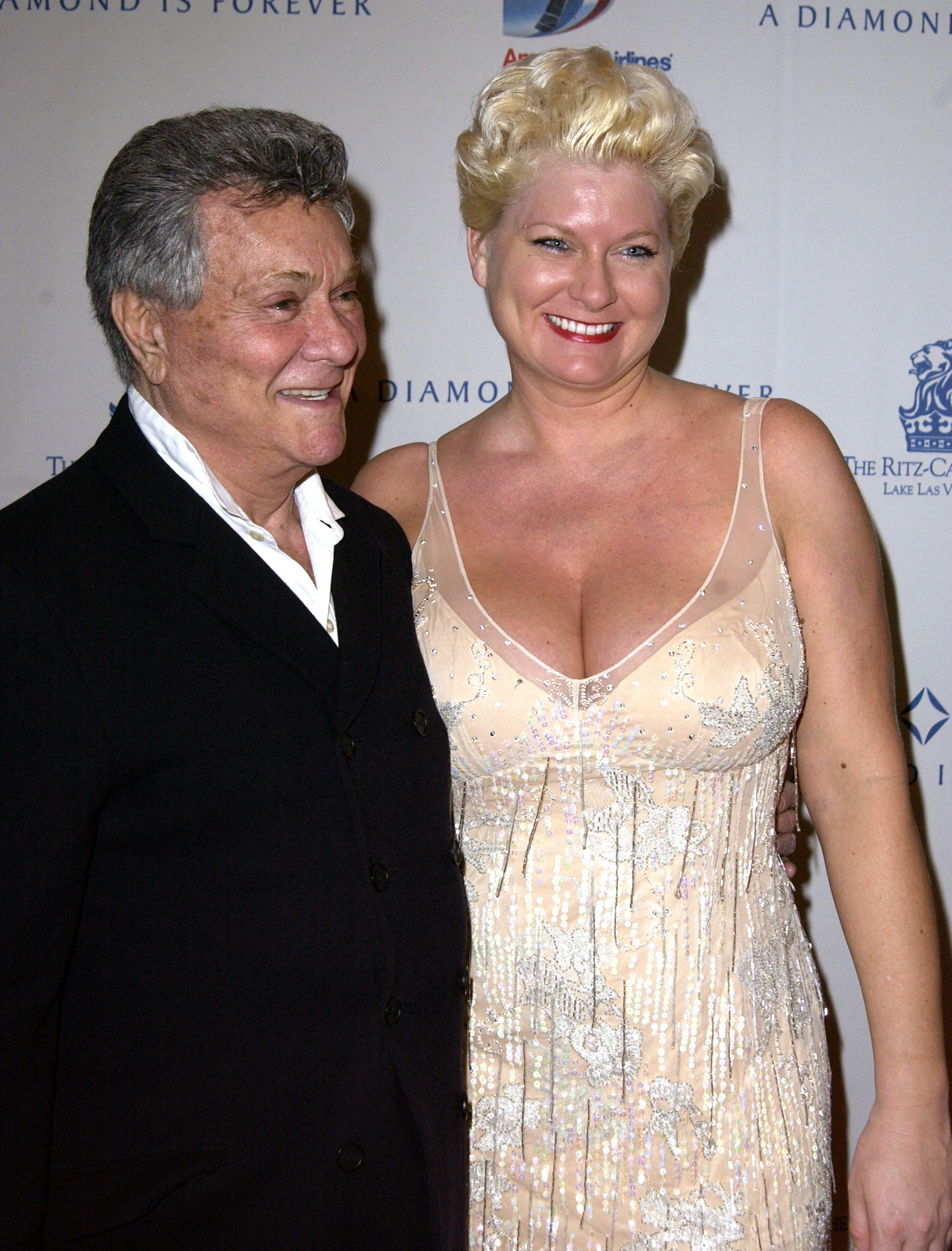 Tony Curtis and Jill Vandenberg during "Diamonds and the Power of Love" Exhibit Opening at Ritz Carlton Lake Las Vegas in Lake Las Vegas, Nevada on February 15, 2003 | Source: Getty Images