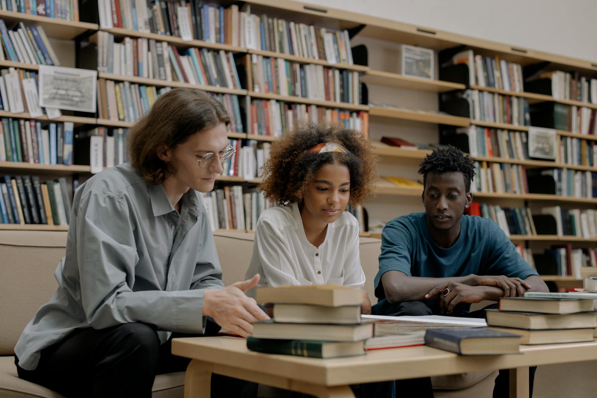 Students in a library | Source: Pexels