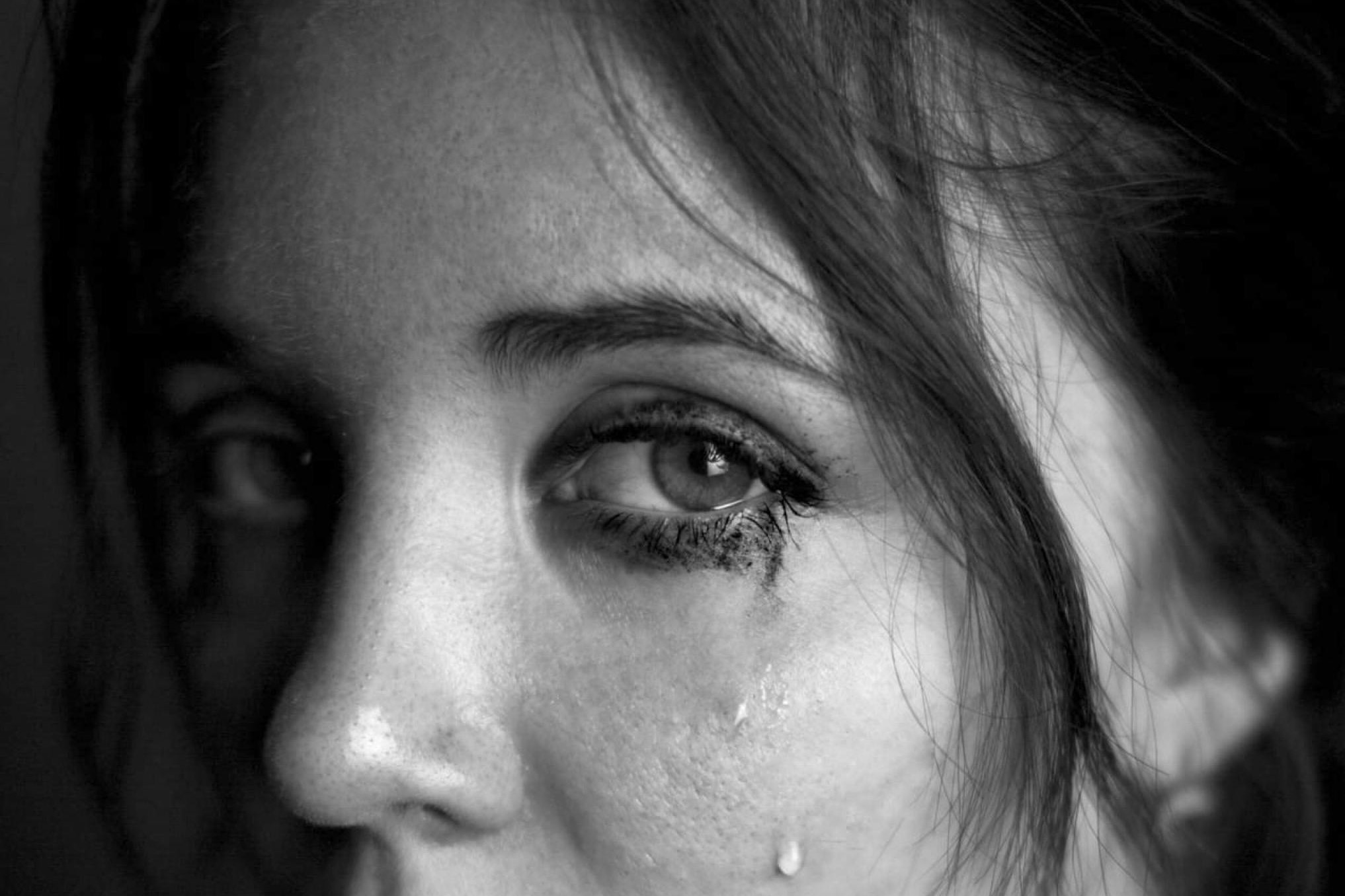 Grayscale close-up shot of a womans teary eyes | Source: Pexels