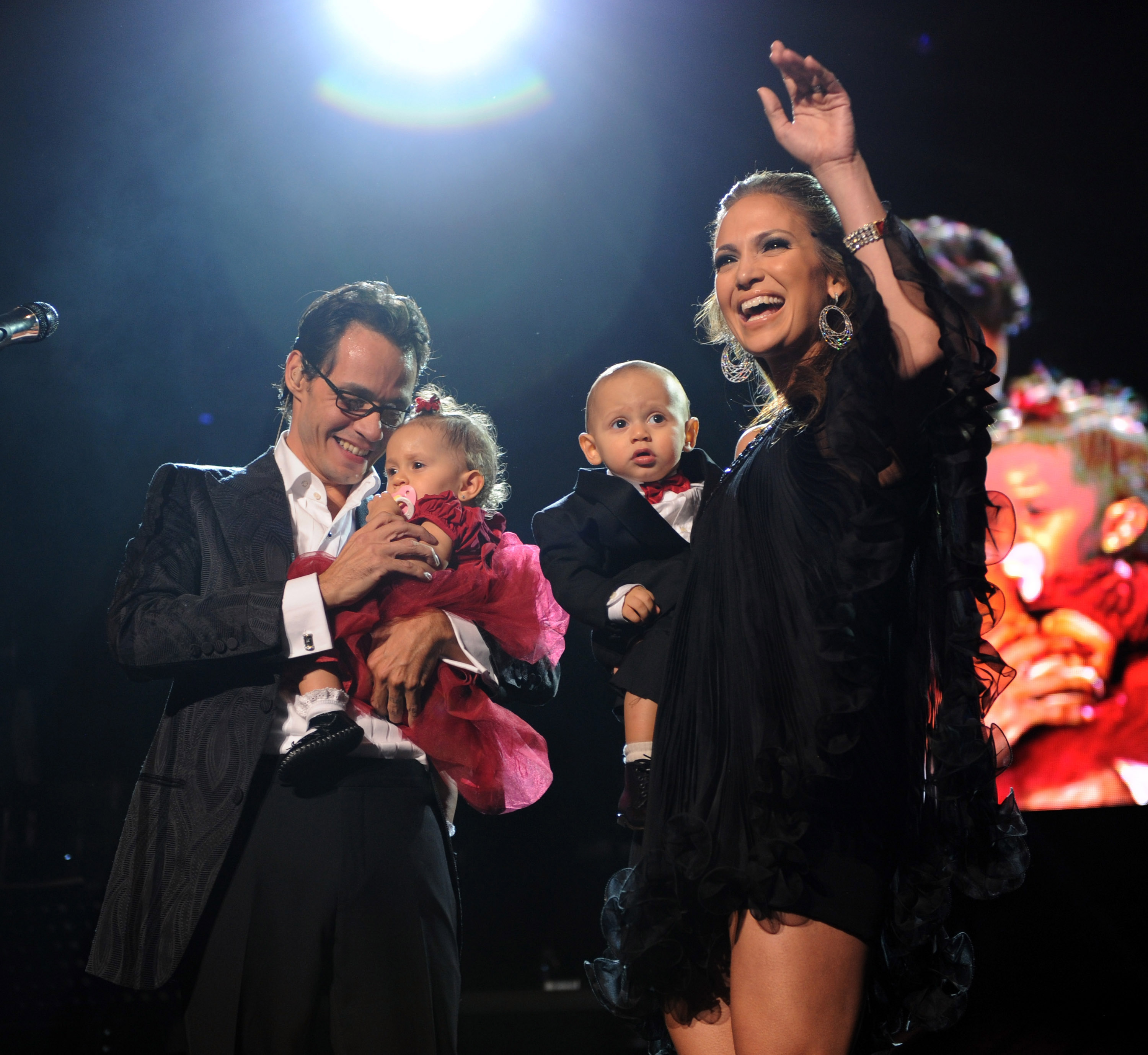Marc Anthony, Jennifer Lopez and their kids Max and Emme on stage before he performs a Valentine's Day show at Madison Square Garden on February 14, 2009, in New York City | Source: Getty Images