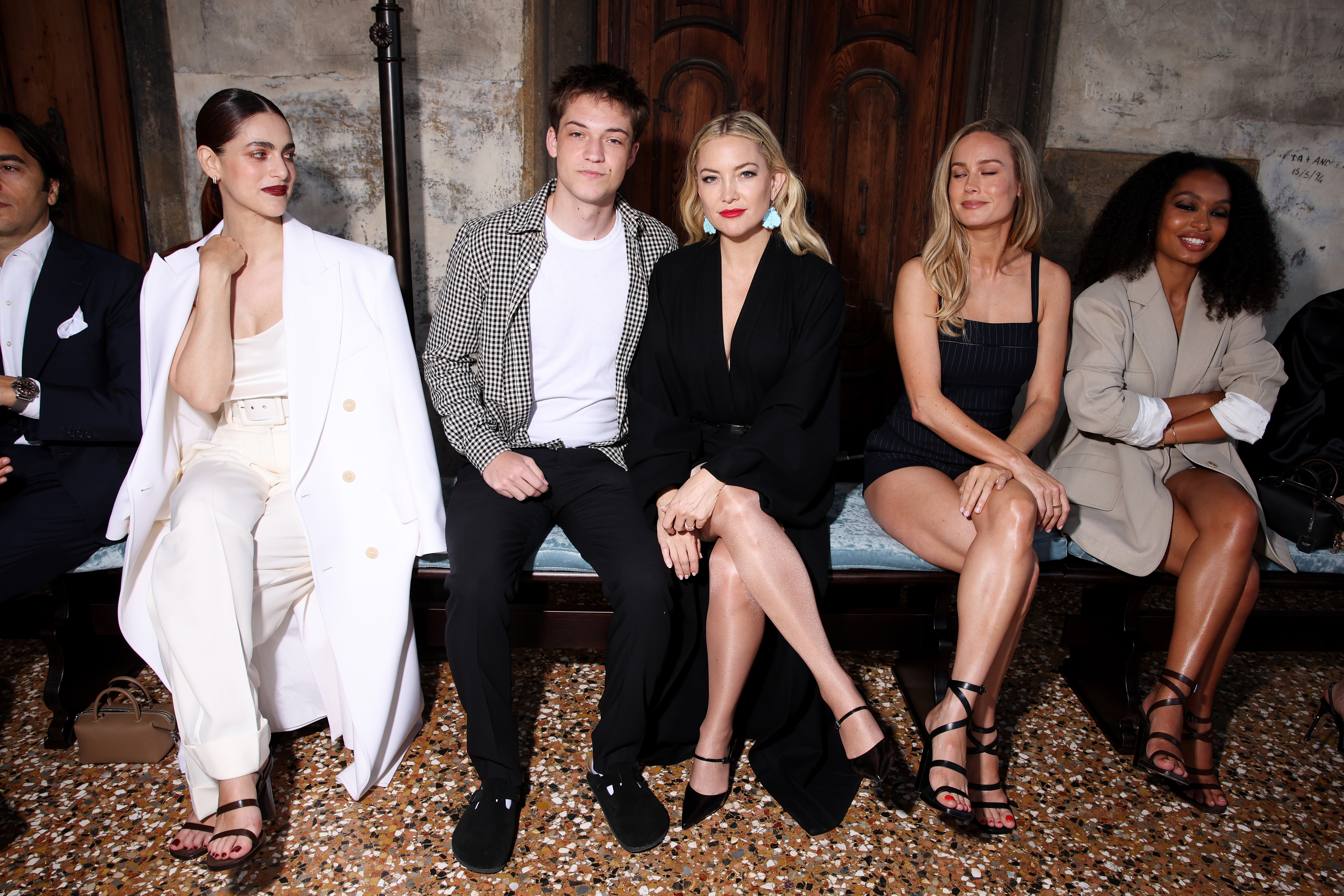 Miriam Leone, Ryder Robinson, Kate Hudson, Brie Larson, and Yara Shahidi sit together at the Max Mara Resort 2025 in Venice, Italy on June 11, 2024. | Source: Getty Image