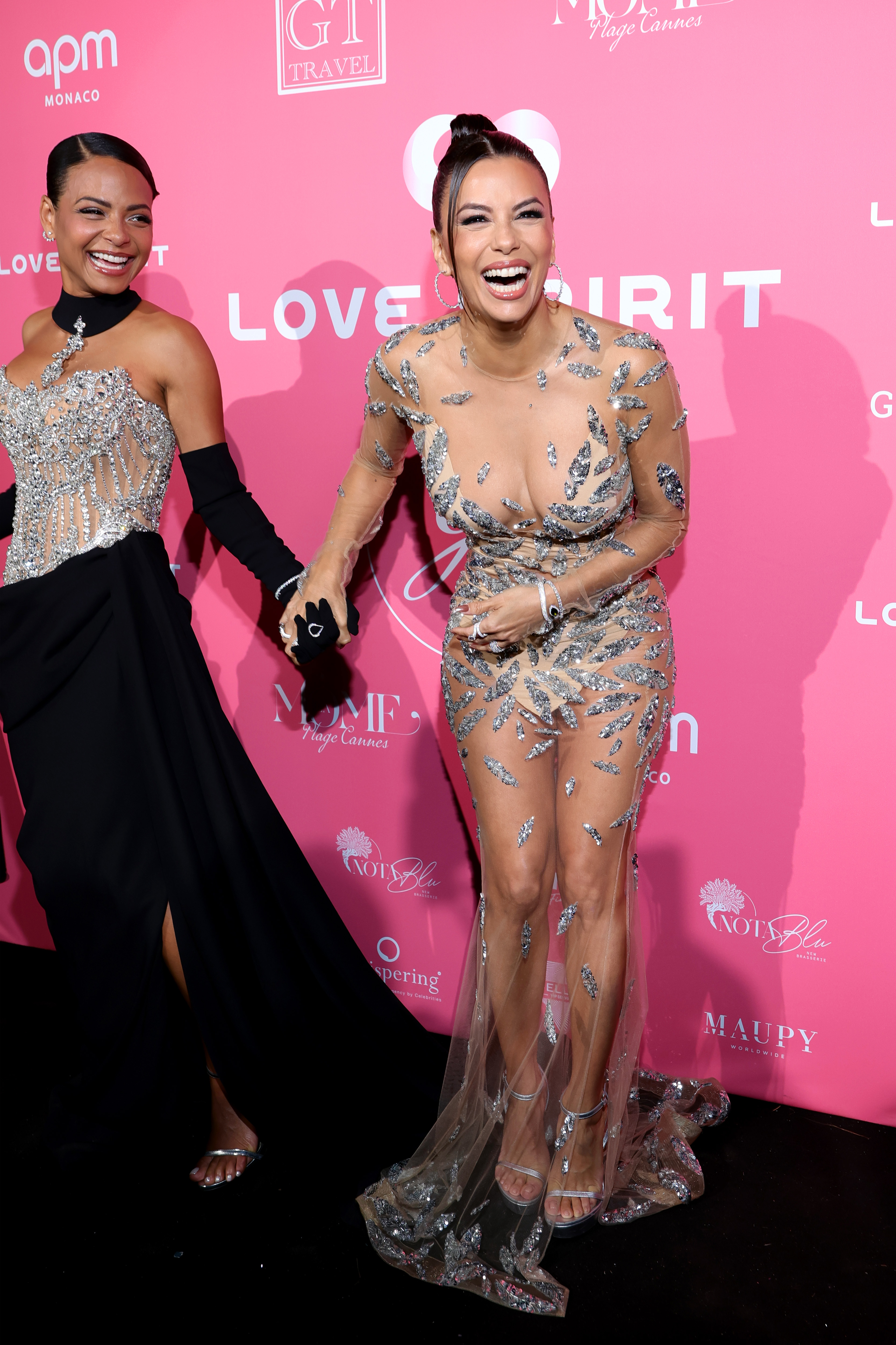 Christina Milian and Eva Longoria at the 10th Global Gift Gala during the 77th annual Cannes Film Festival in Cannes, France on May 19, 2024 | Source: Getty Images
