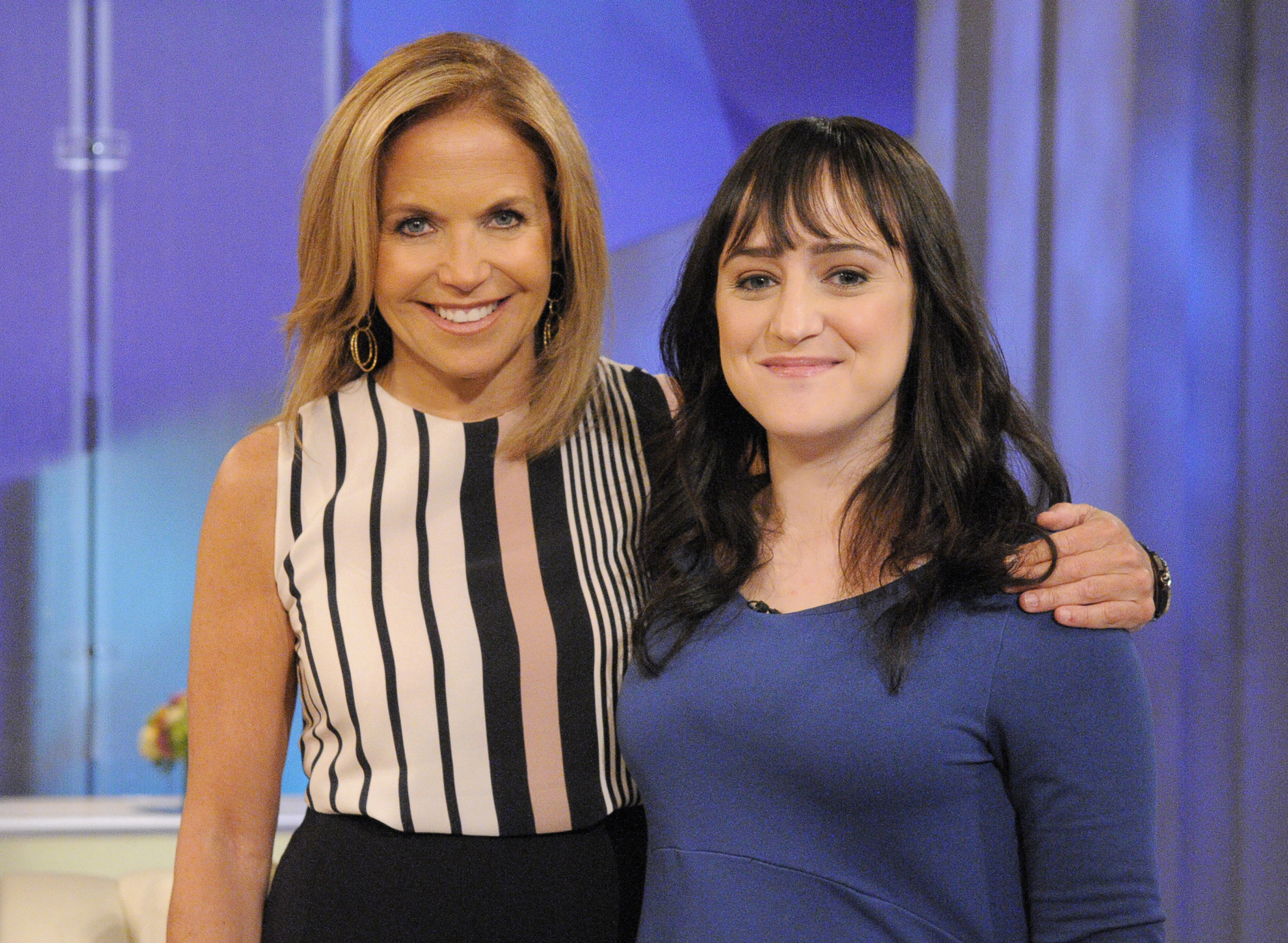 Katie Couric and Mara Wilson pictured on the set of ABC's "Katie" on May 29, 2013 | Source: Getty Images