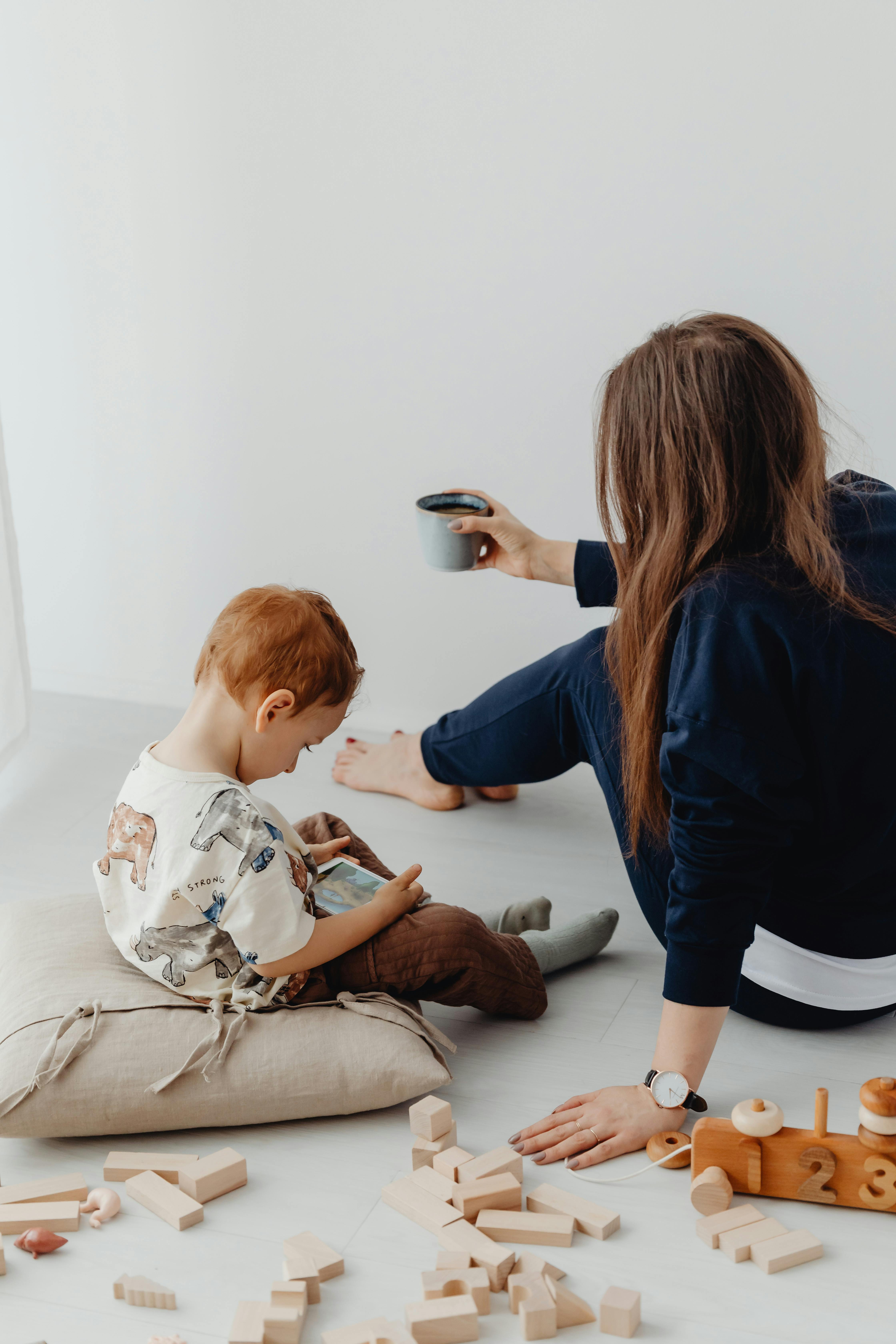 Mother watching her son play | Source: Pexels
