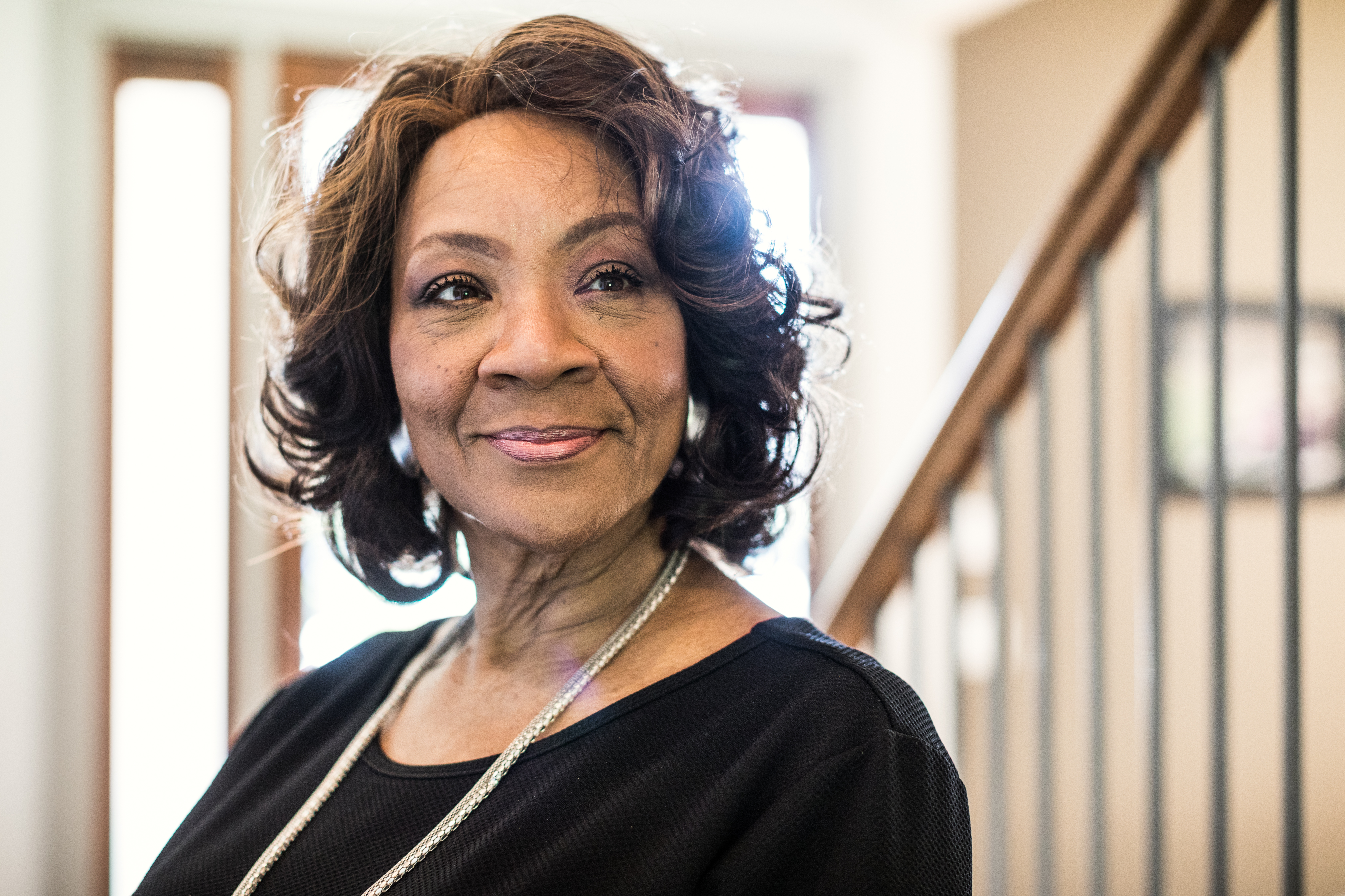 Portrait of senior woman in hallway of home | Source: Getty Images