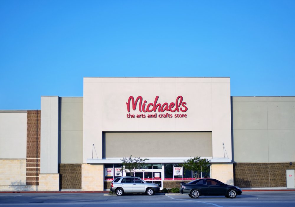 A Michael's arts and crafts storefront in Humble, Texas with a clear blue sky in the background on August 2, 2019 | Photo: Shutterstock/Brett Hondow