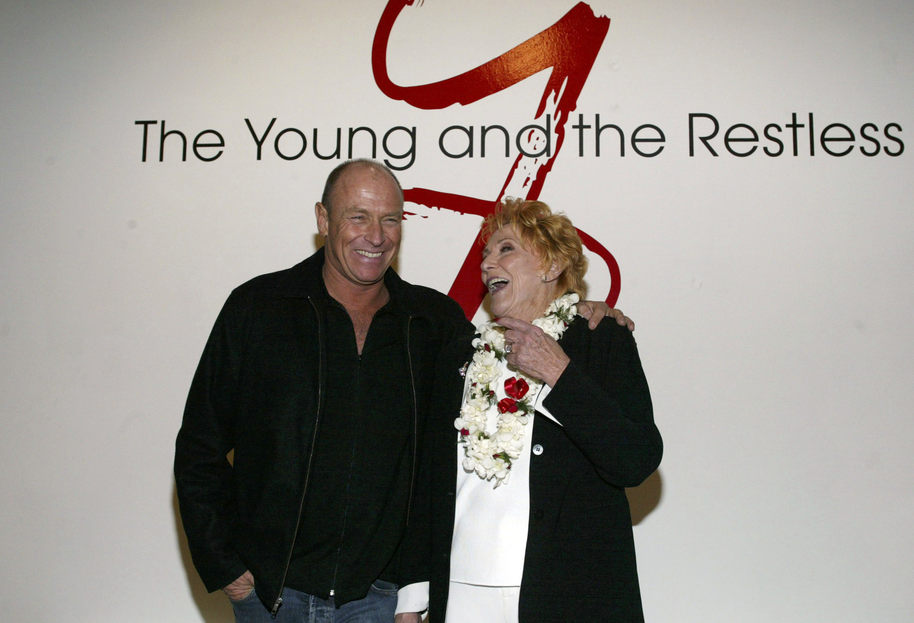 Corbin Bersen and his mother Jeanne Cooper at the "The Young and the Restless" celebration for actress Jeanne Cooper's 30th year anniversary on the show at CBS Television City on January 28, 2004 in Los Angeles, California. | Source: Getty Images