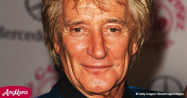 Rod Stewart is seen beaming while taking a photo with his four sons. They all look so grown-up