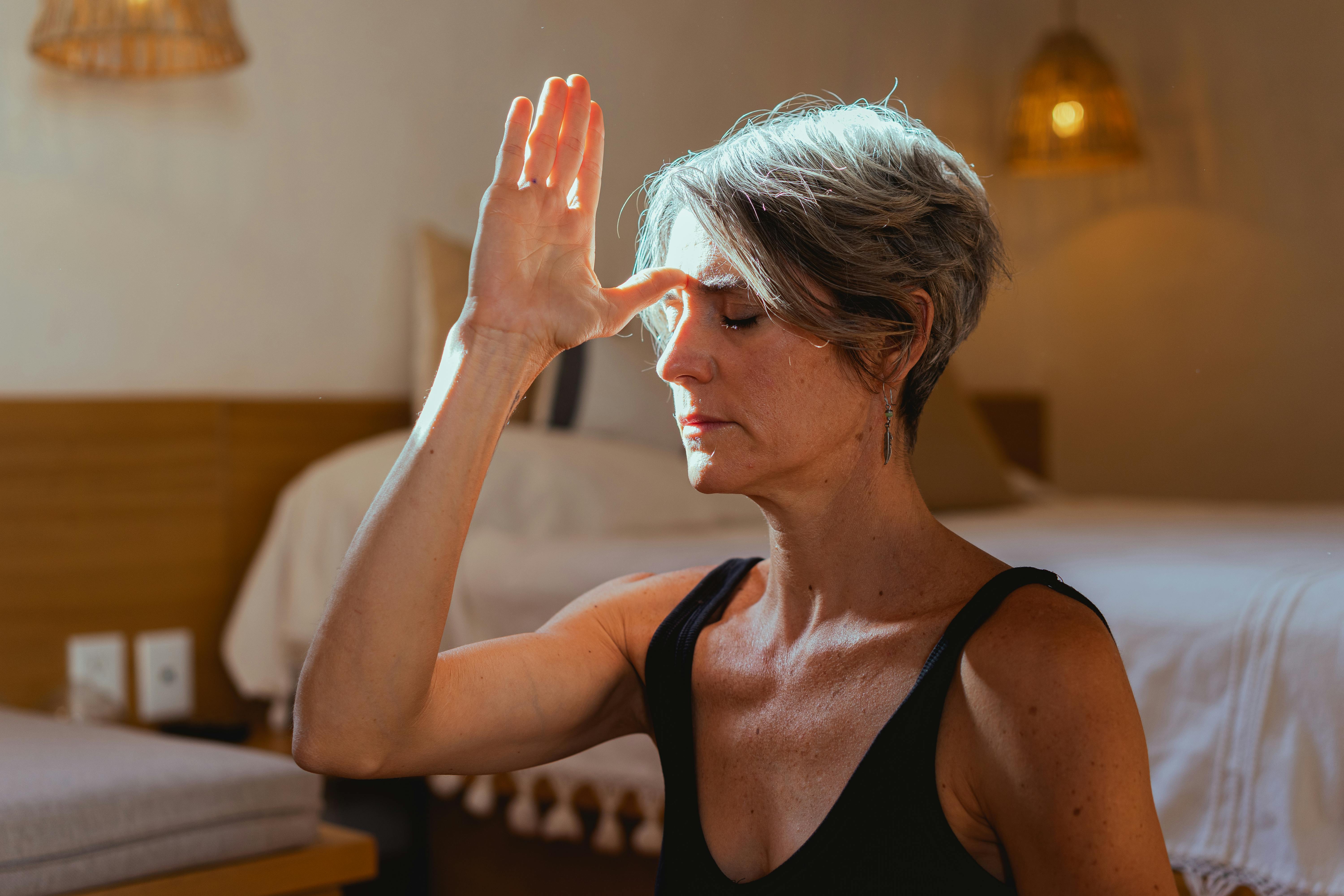 Woman meditating | Source: Pexels