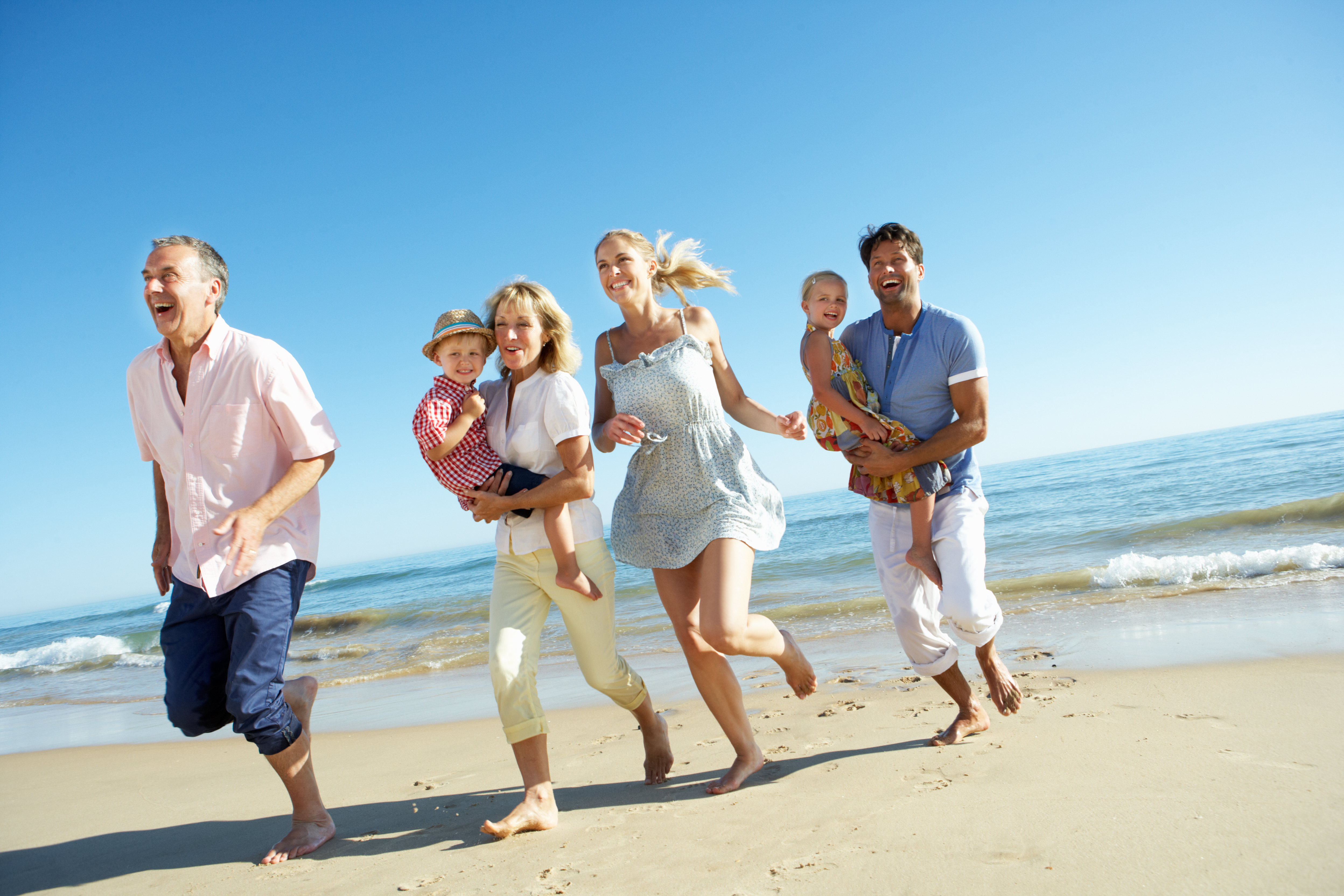 A family enjoying at the beach | Source: Shutterstock