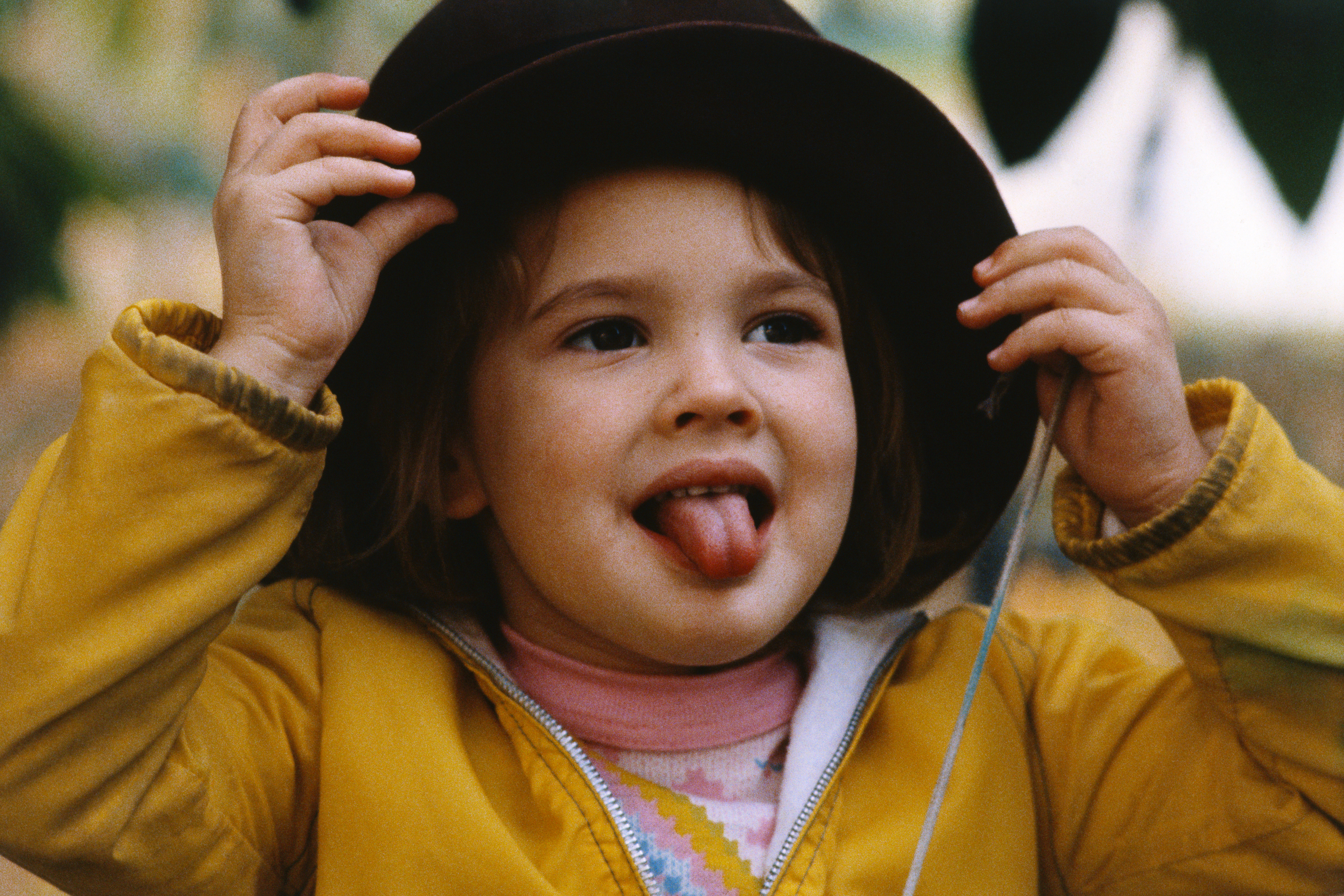 The movie star, 4, imagines she's a grownup as she tried on one of her mother's hats on March 21, 1979. | Source: Getty Images