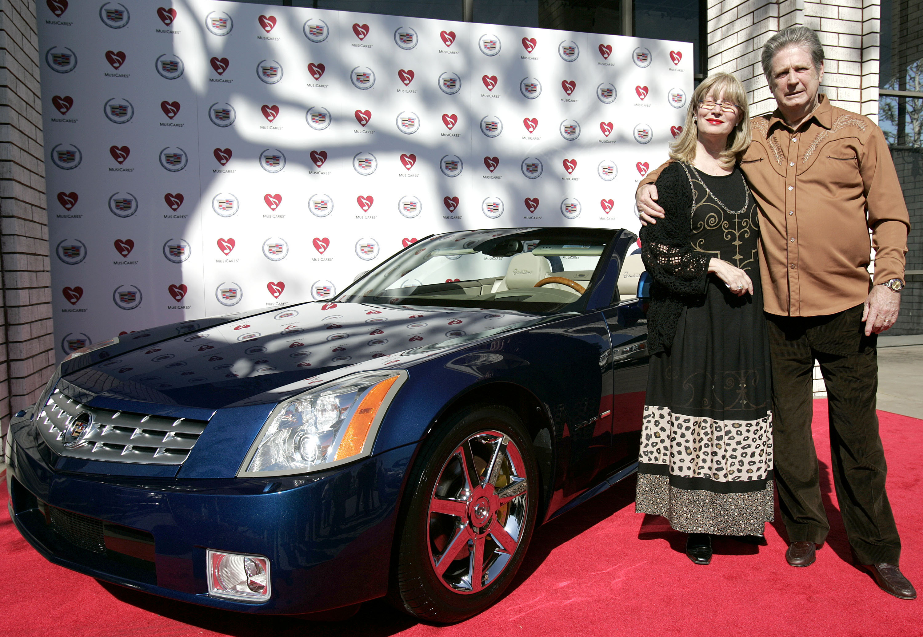Brian and Melinda Wilson during the unveiling of the Brian Wilson inspired XLR at Martin Cadillac Dealership in Los Angeles, California, in 2005. | Source: Getty Images