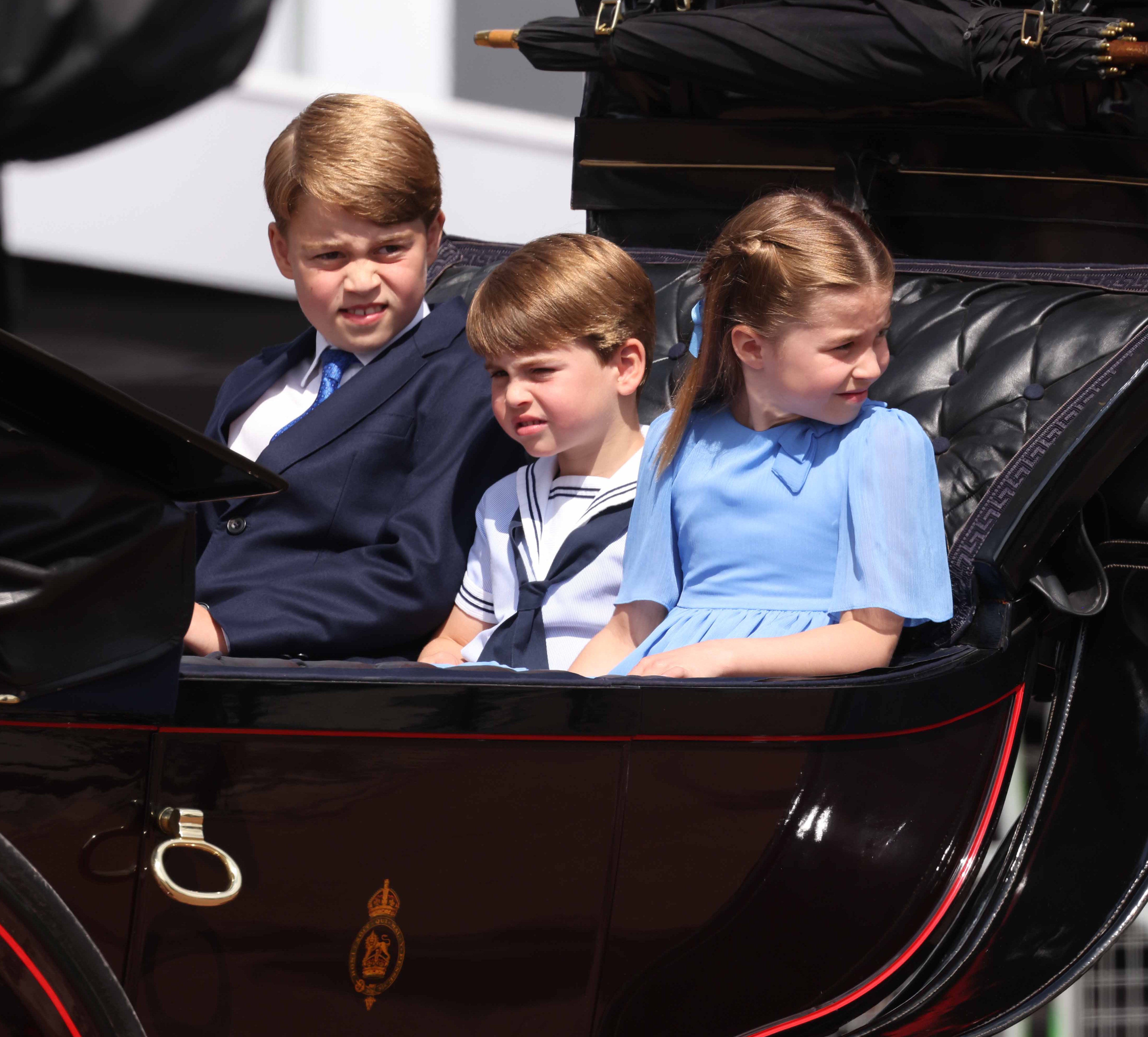 Prince George of Cambridge, Prince Louis of Cambridge and Princess Charlotte of Cambridge in a horse-drawn carriage at the Trooping The Colour on June 2, 2022 in London, England. | Source: Getty Images
