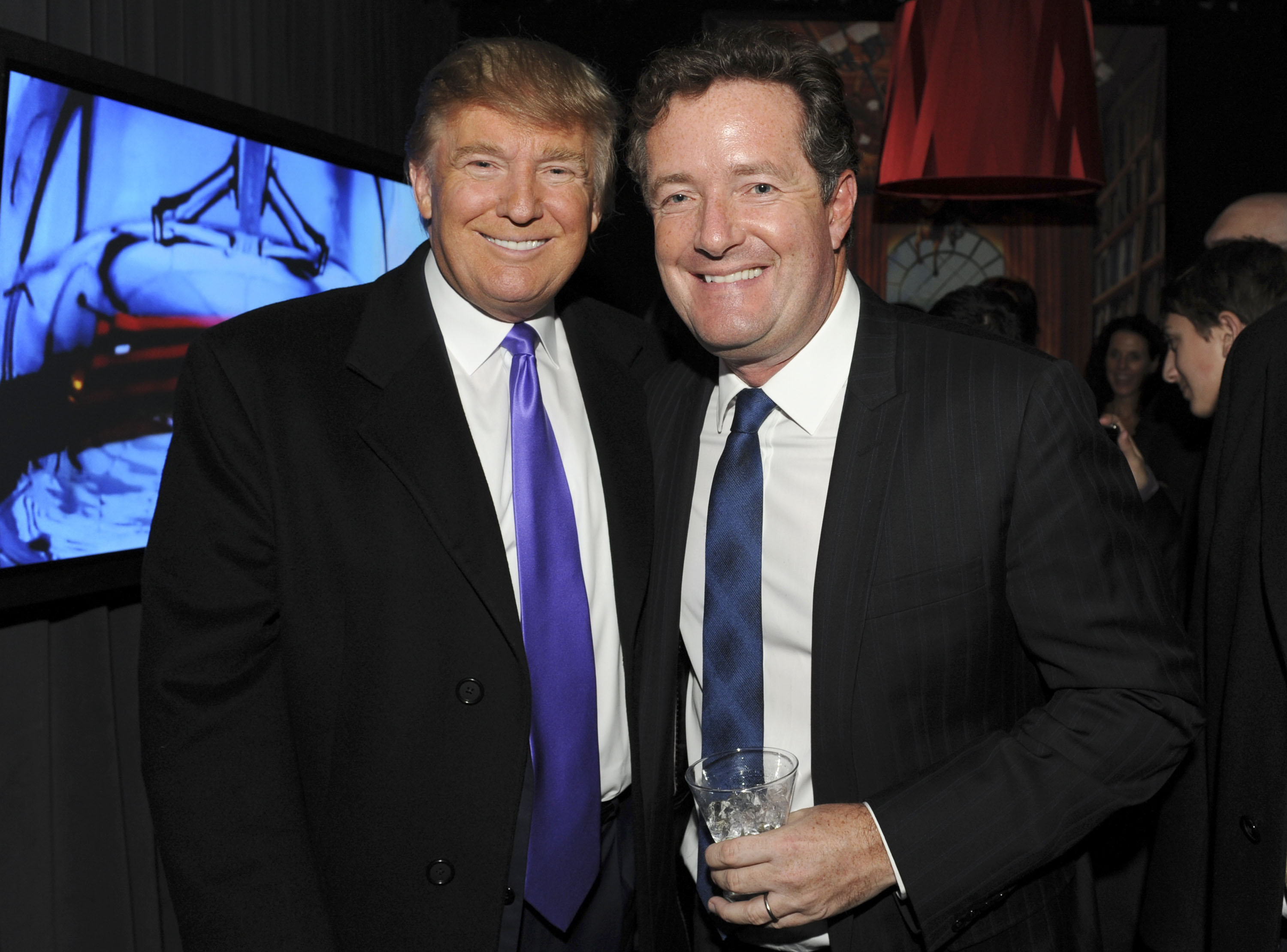 Donald Trump and Piers Morgan at the celebration of Perfumania and Kim Kardashian's appearance on NBC's "The Apprentice" on November 10, 2010, in New York. | Source: Getty Images