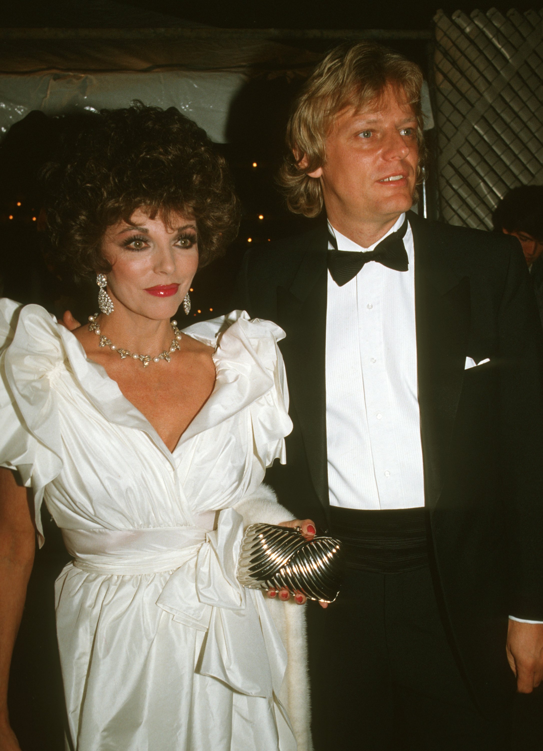 Joan Collins and Peter Holm during Variety Arts Club Celebrity Tribute to Lucille Ball at NBC TV Studios in Burbank, California. | Source: Getty Images