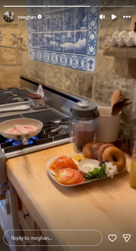 A birthday meal appeared to be in the works as Meghan's Instagram Story showed food cooking on the stove alongside bagels, sliced tomatoes and other fresh ingredients in the couple's kitchen. | Source: Instagram/meghan