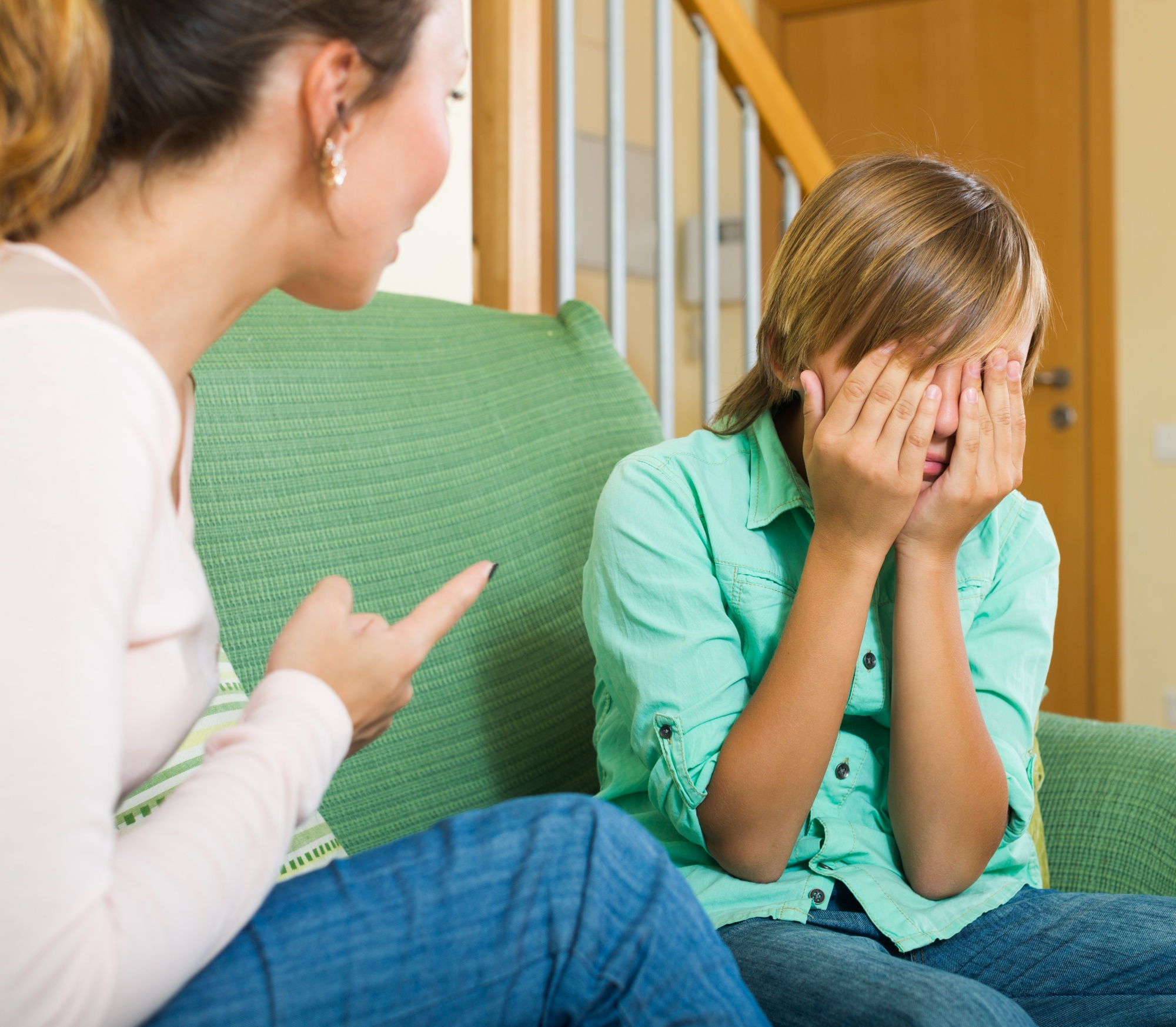 A mother scolding her disobedient son | Source: Freepik