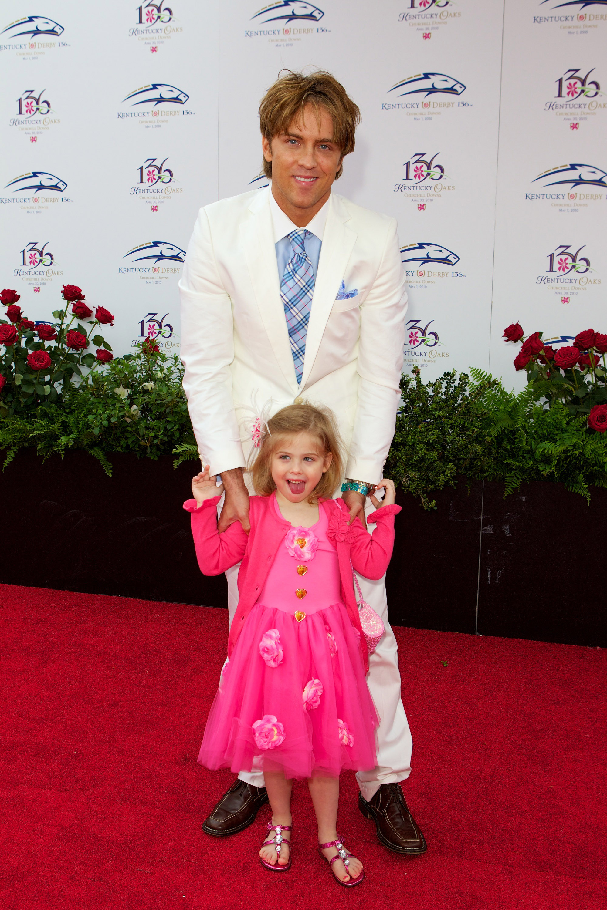 Larry Birkhead and Dannielynn Birkhead attend the Kentucky Derby at Churchill Downs on May 1, 2010, in Louisville, Kentucky.