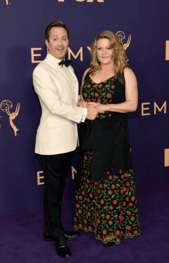 Thomas Lennon and Jenny Robertson pose on the purple carpet at the 71st Emmy Awards on September 22, 2019, in Los Angeles, California | Source: Getty Images