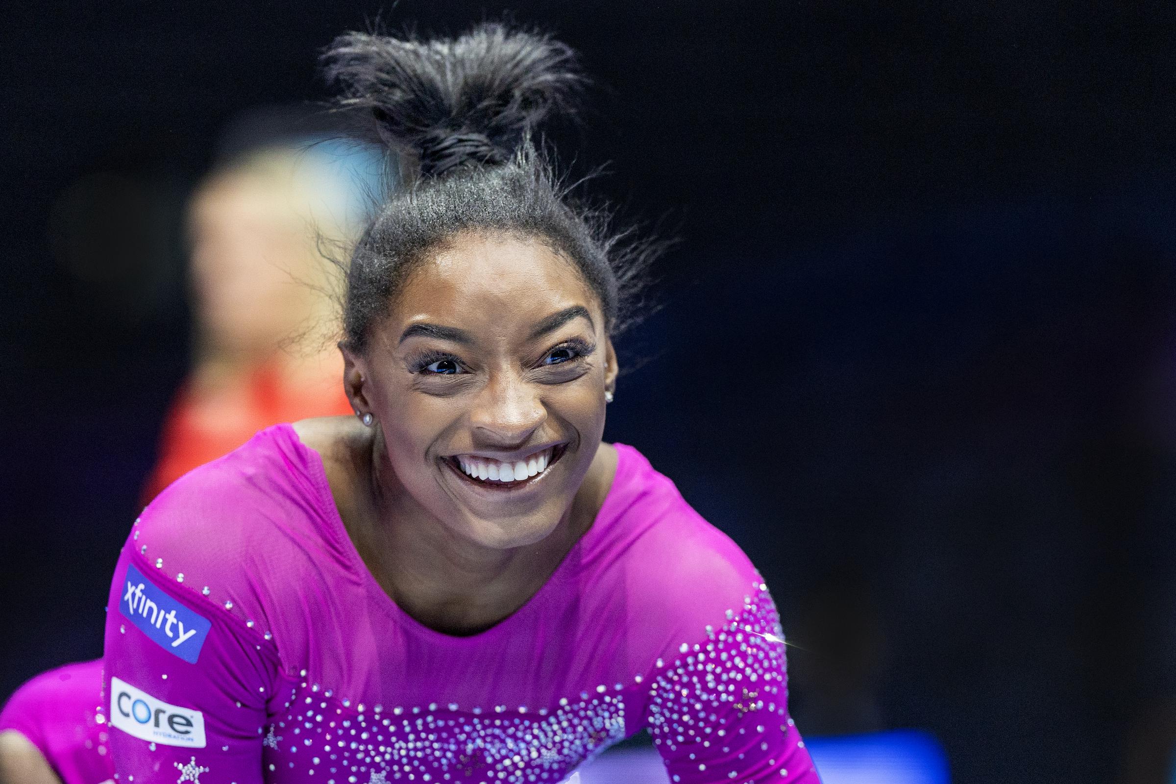 Simone Biles reacts after landing awkwardly while performing a vault during podium training at the Artistic Gymnastics World Championships-Antwerp 2023 on September 29, 2023, in Antwerp, Belgium | Source: Getty Images