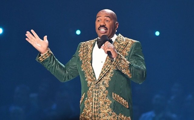 Steve Harvey speaks onstage during the 2019 Miss Universe Pageant at Tyler Perry Studios on December 8, 2019 | Source: Getty Images/GlobalImagesUkraine