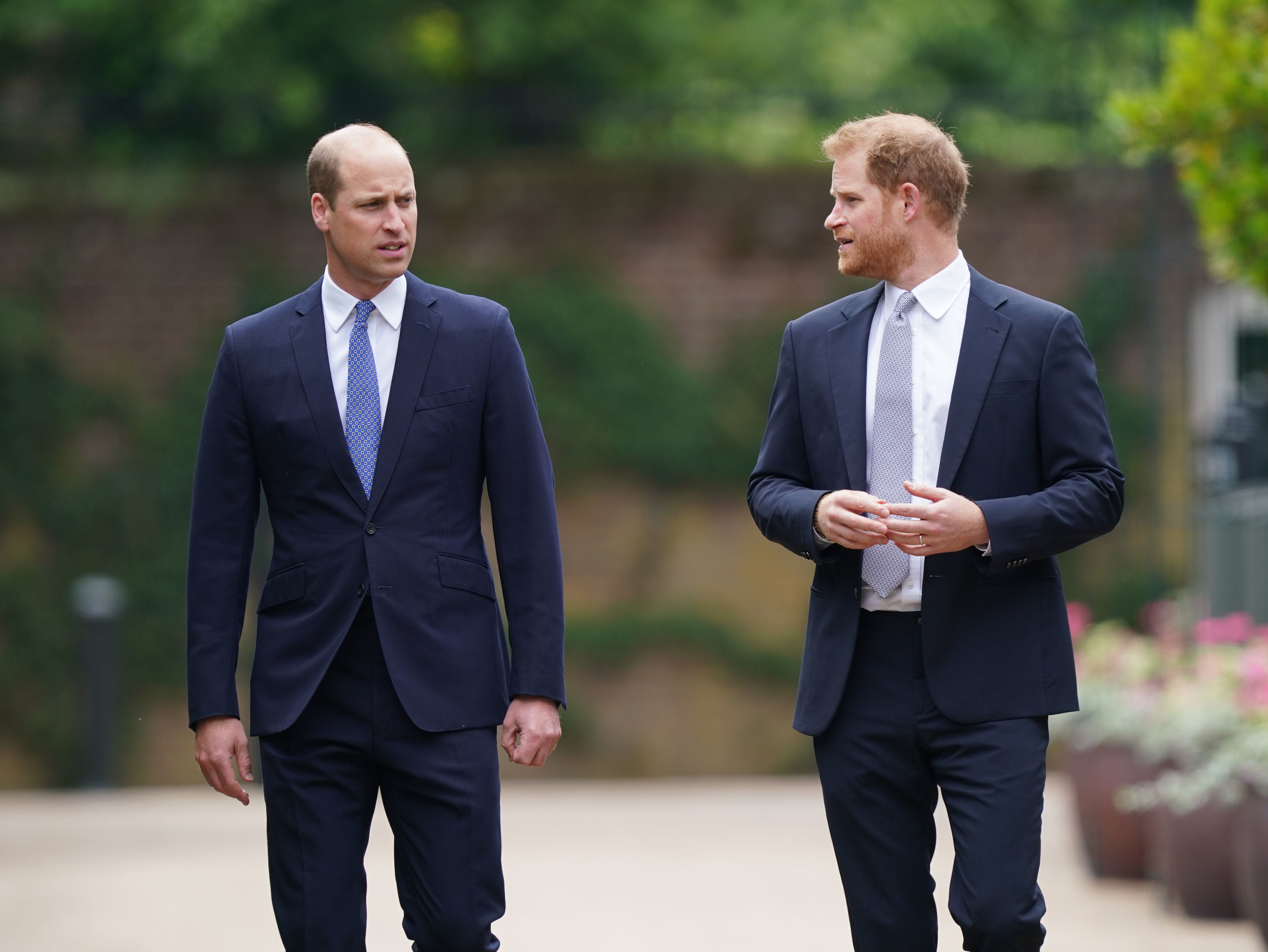 Prince William and Prince Harry at the unveiling of their late mother, Princess Diana's statue that they commissioned of her in London, England on July 1, 2021 | Source: Getty Images