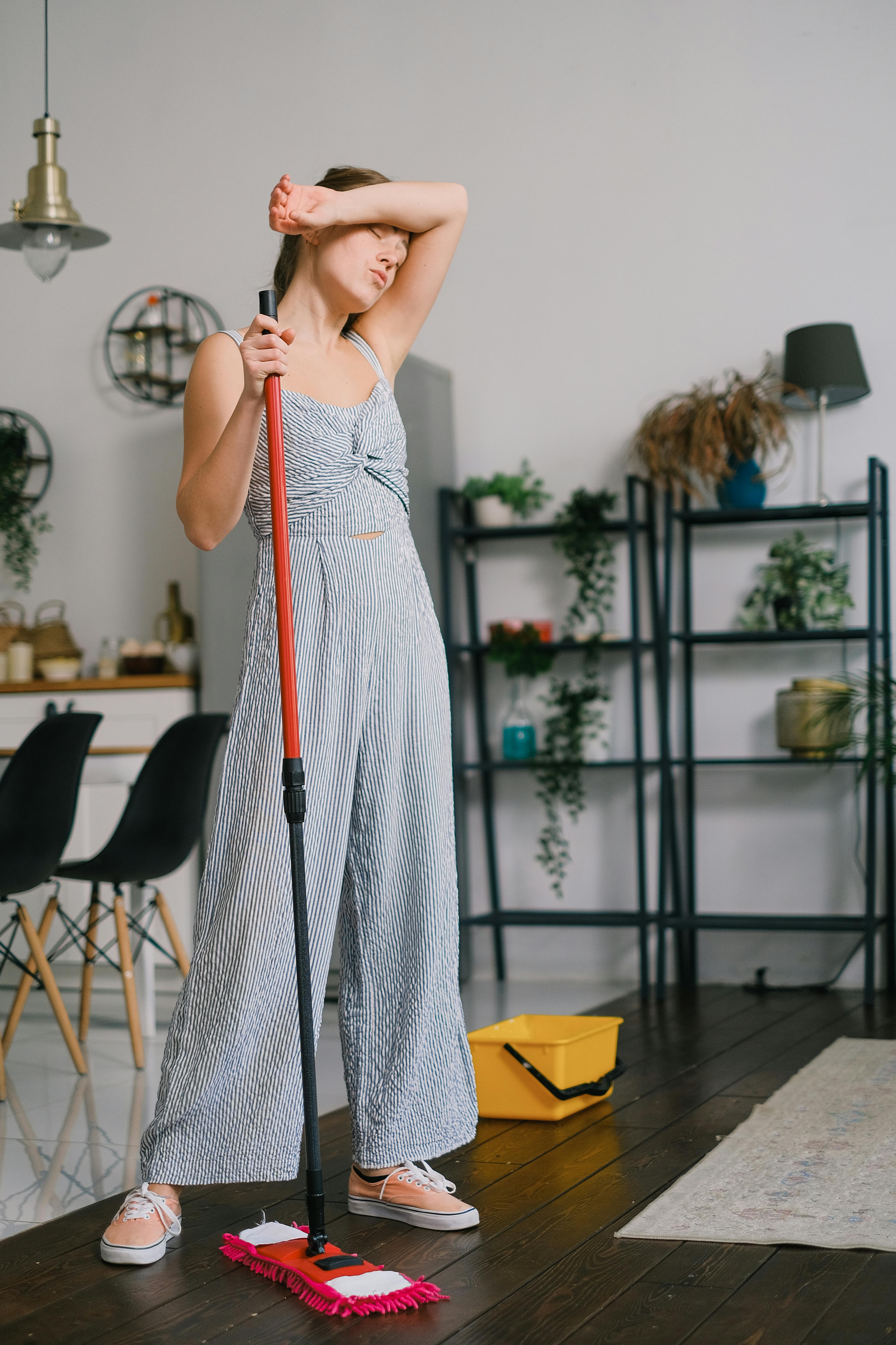 A woman exhausted from cleaning | Source: Pexels