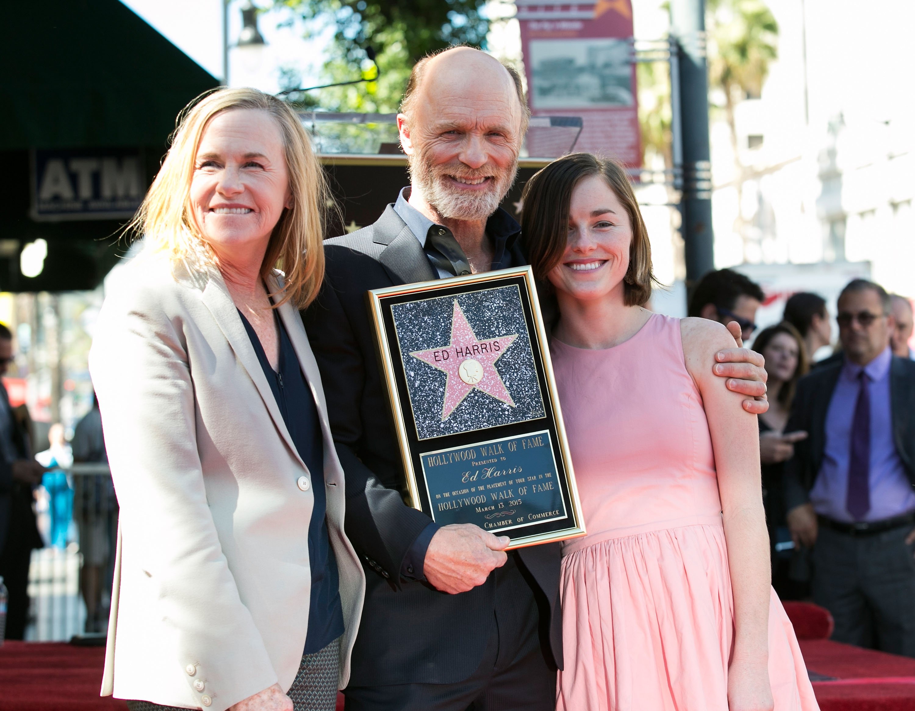 Amy Madigan, Ed Harris and Lily Dolores Harris attend The Hollywood Walk of Fame ceremony honoring Ed Harris on March 13, 2015 in Hollywood | Source: Getty Images