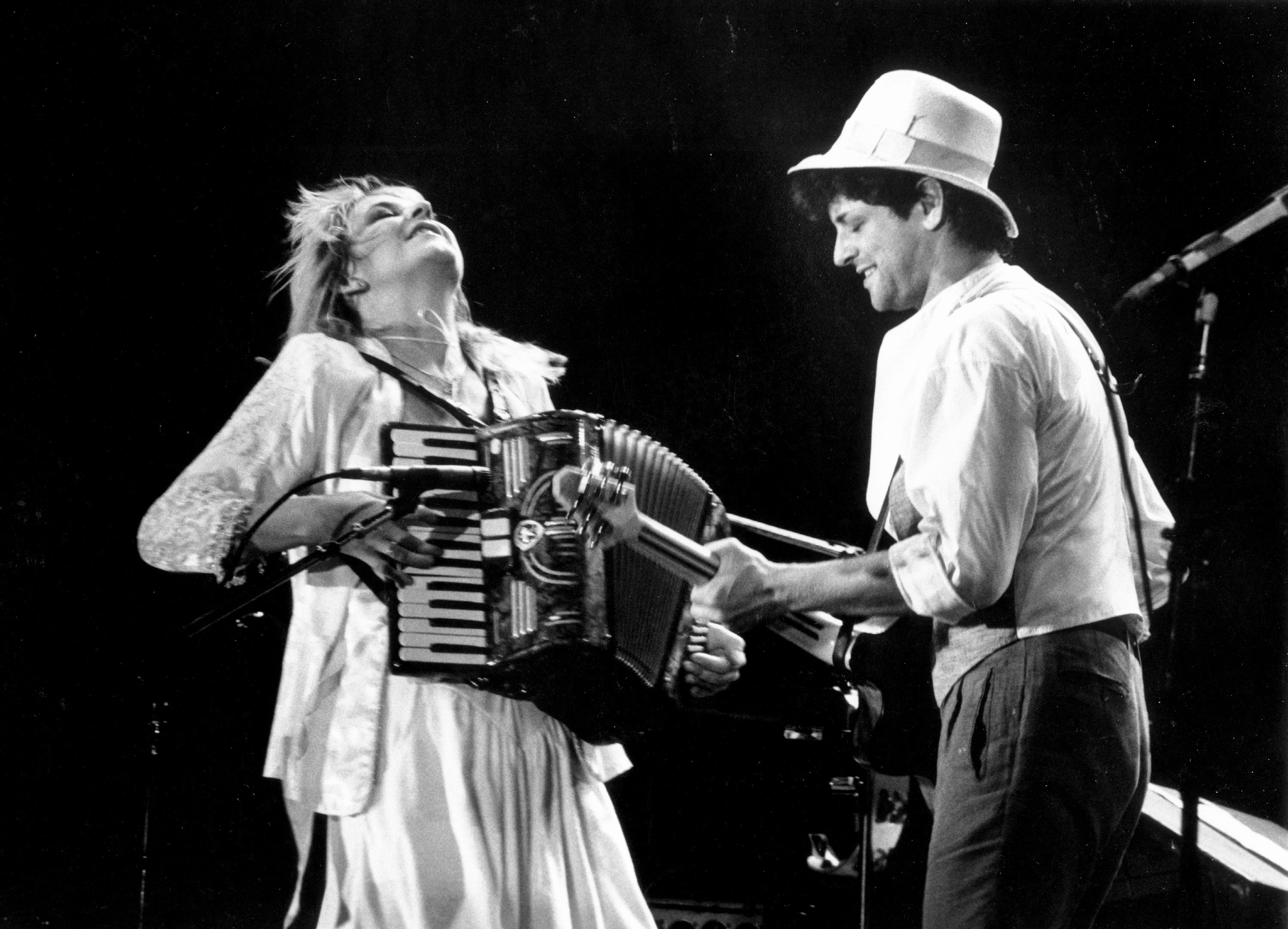 Stevie Nicks and Lindsey Buckingham of the rock group "Fleetwood Mac" perform onstage at the US Festival in May 1983 in San Bernardino, California | Source: Getty Images