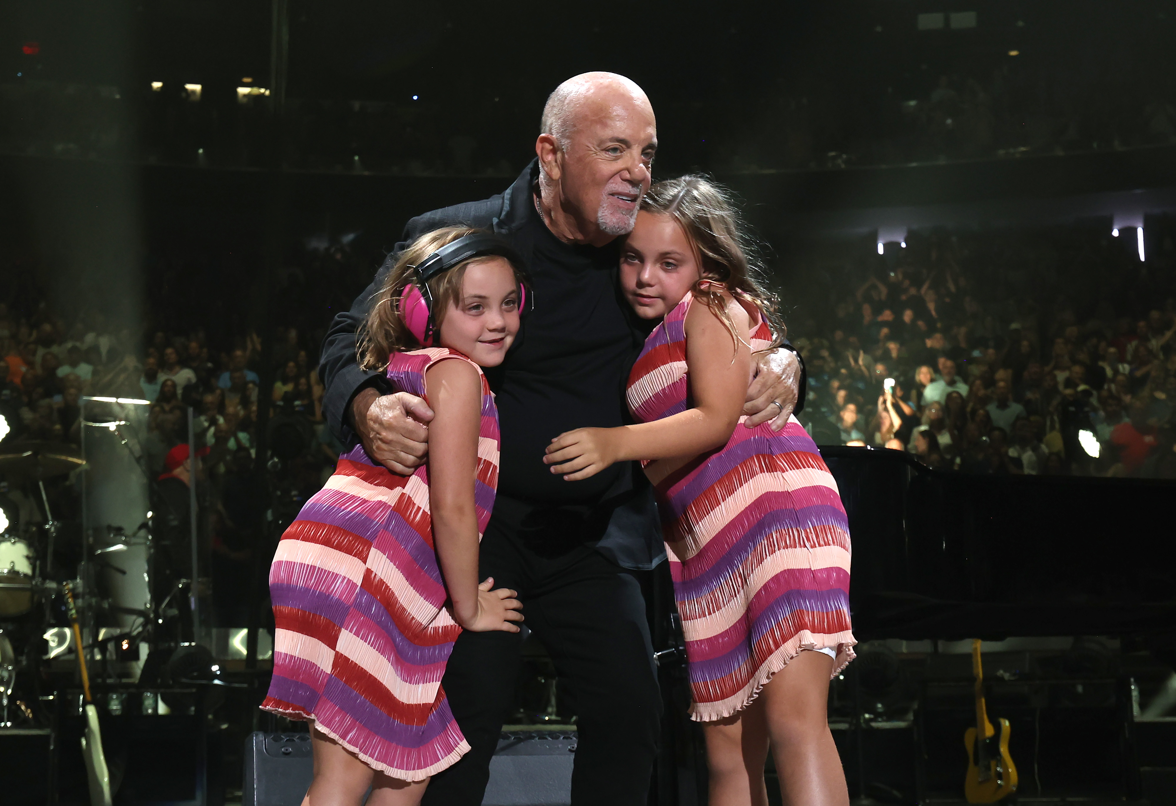 Della Rose, Billy, and Remy Joel perform during the last show of his residency at Madison Square Garden on July 25, 2024, in New York City | Source: Getty Images