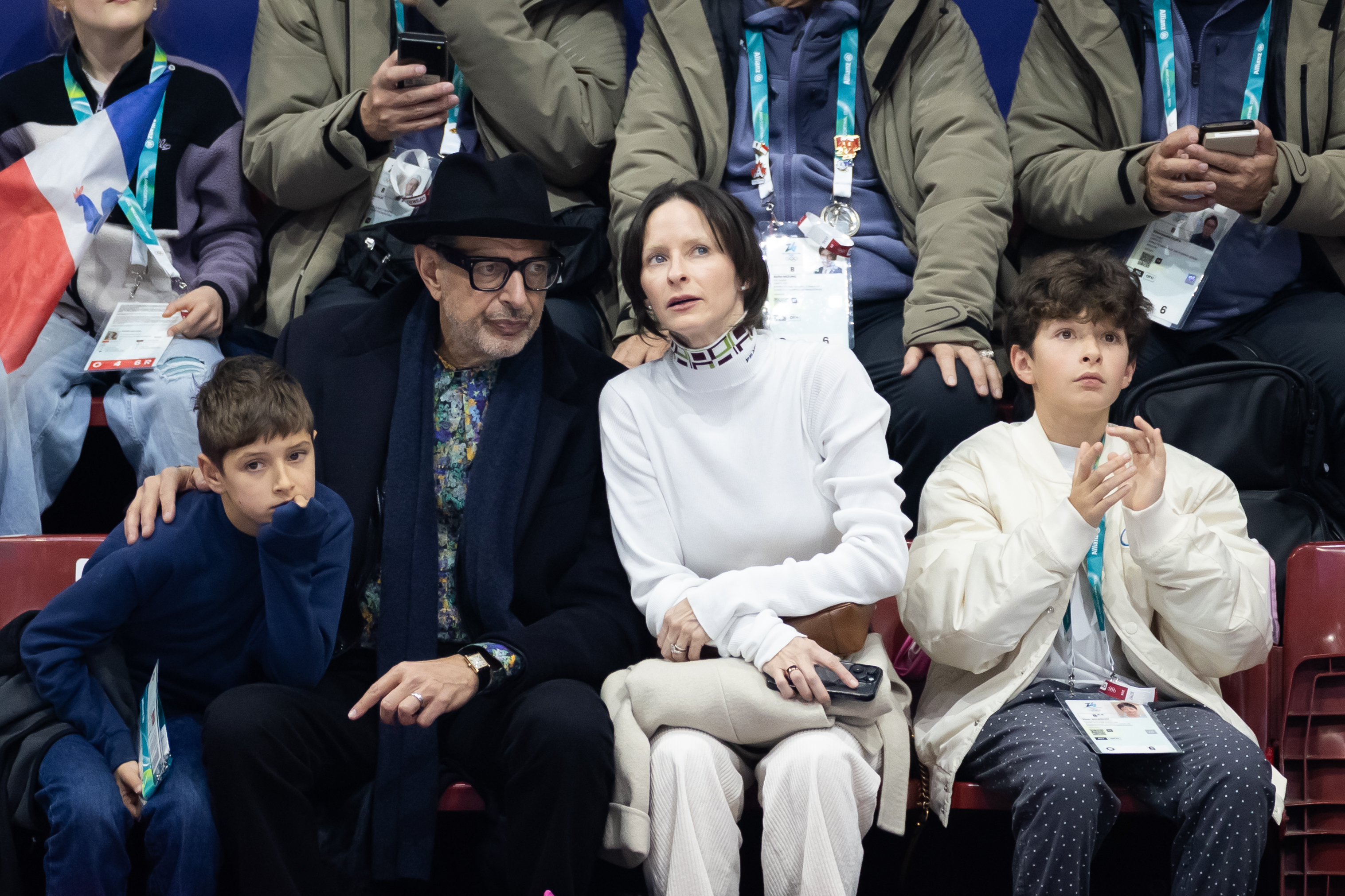 Jeff Goldblum, Emilie Livingston, and their sons Charlie Ocean and River Joe attend the Men Single Skating event during the Winter Olympic Games at the Milano Ice Skating Arena on February 13, 2026, in Milan, Italy | Source: Getty Images