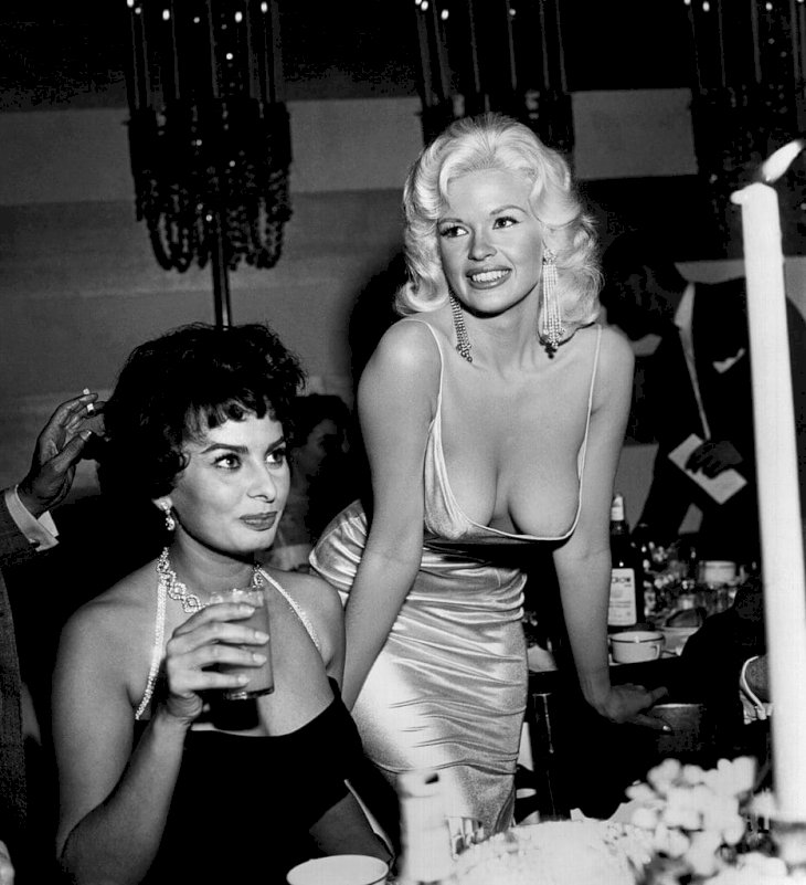 Jayne Mansfield at a 20th Century-Fox party to promote Sophia Loren on April 12, 1957 in Los Angeles, California