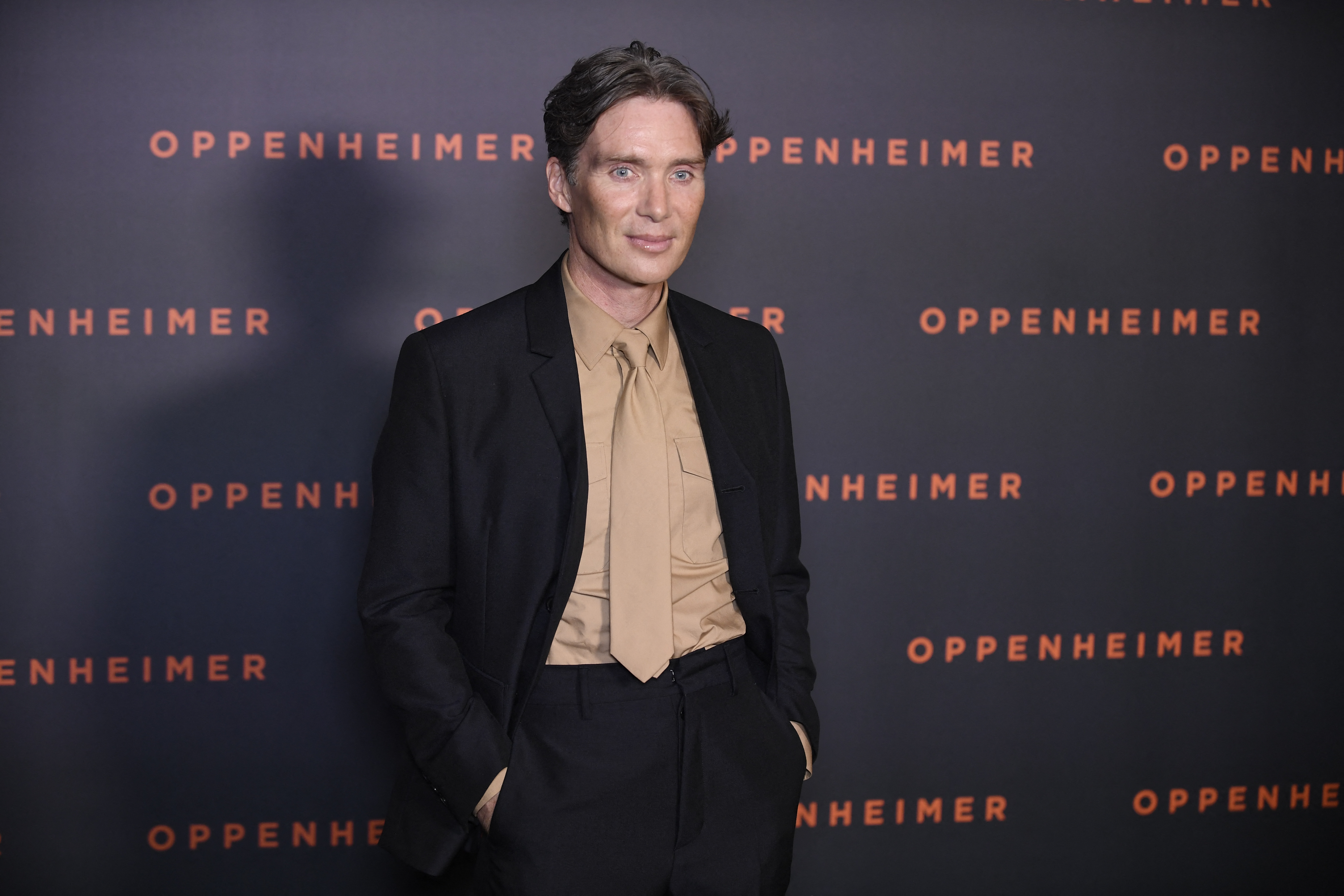 Cillian Murphy poses upon his arrival for the premiere of the movie "Oppenheimer" at the Grand Rex cinema in Paris on July 11, 2023. | Source: Getty Images