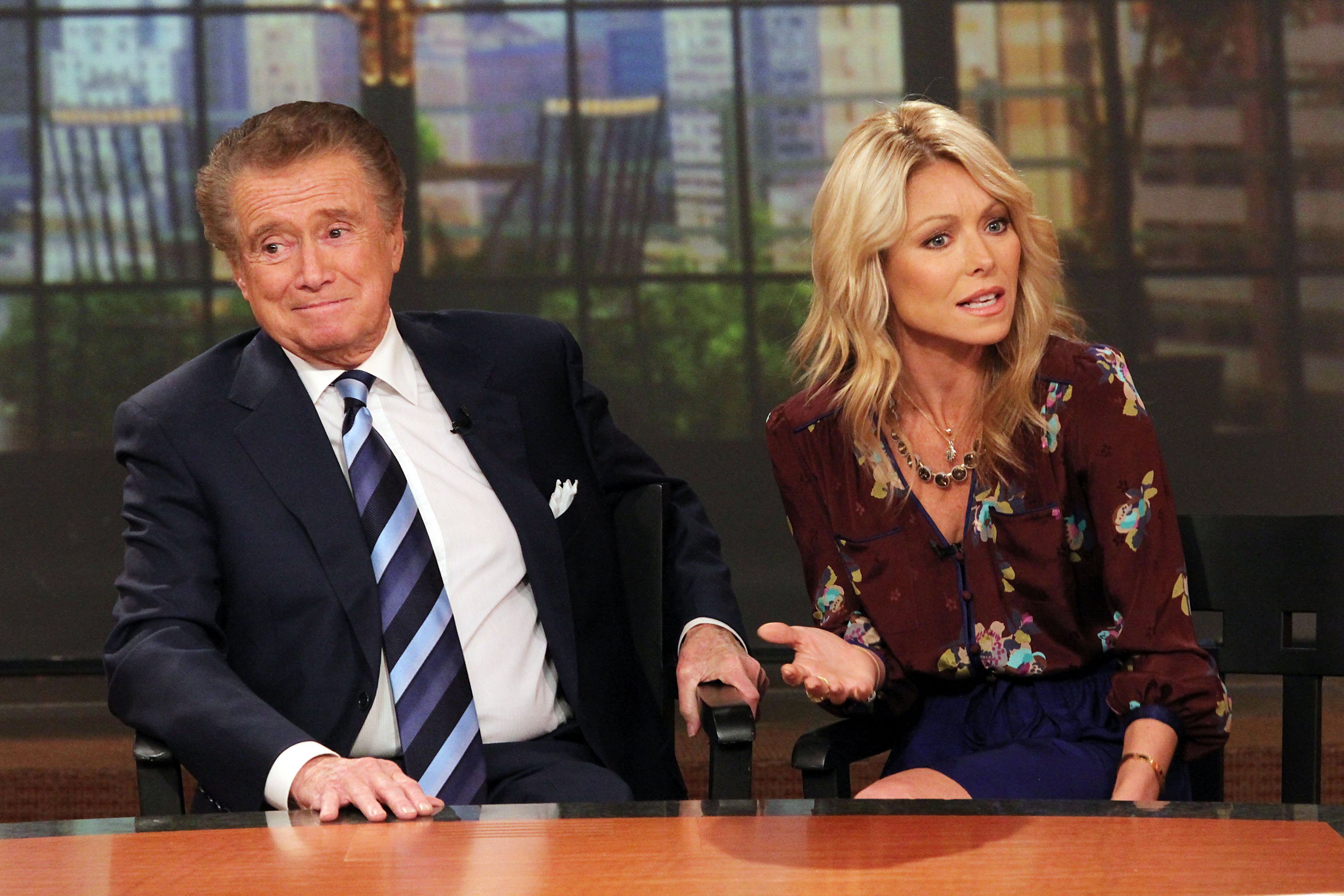Regis Philbin and Kelly Ripa attend a press conference on Regis's departure from "LIVE! with Regis and Kelly" on November 17, 2011, in New York City. | Source: Getty Images.