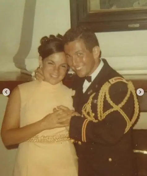 A young Ina and Jeffrey Garten share a tender embrace, with Jeffrey in his military dress uniform and Ina glowing beside him. This early photo captures the love and admiration that has been at the heart of their five-decade journey together. | Source: Instagram/inagarten