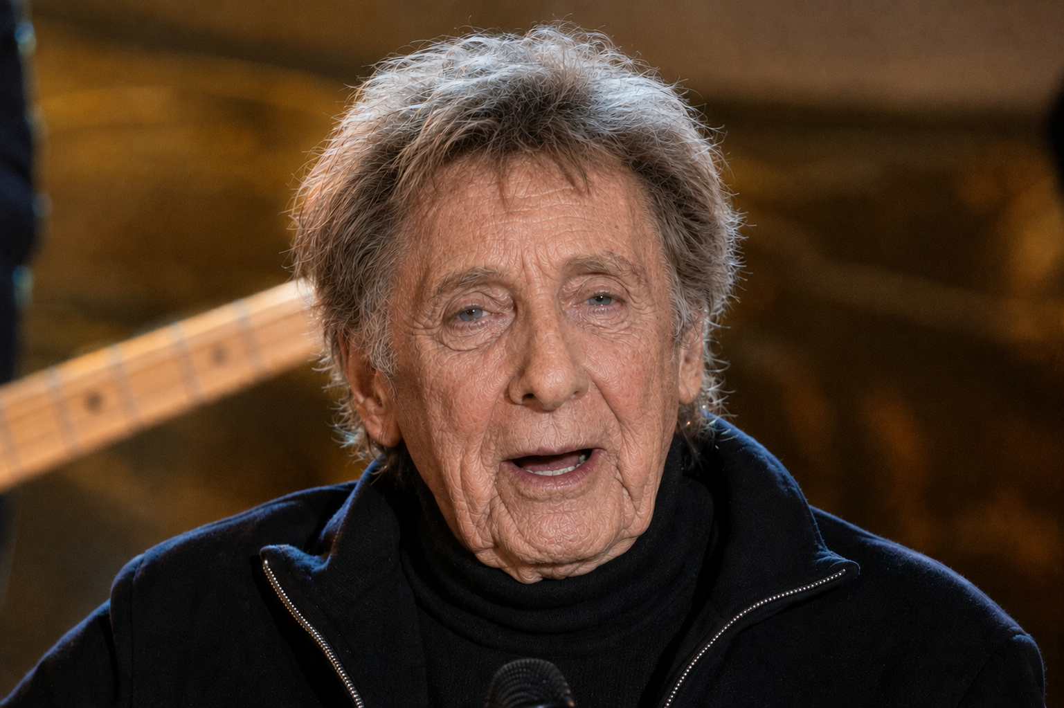 This image puts less emphasis on performance and more on Manilow's face. The calmer setting makes the imagined aging feel more natural and less dramatic than in the concert-based versions. | Source: ChatGPT