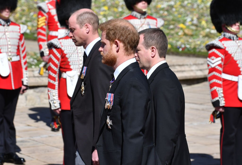 Prince William, Prince Harry, and Peter Phillips walk behind Prince Philip's coffin during the funeral at Windsor Castle on April 17, 2021 in Windsor, United Kingdom. | Photo: Getty Images