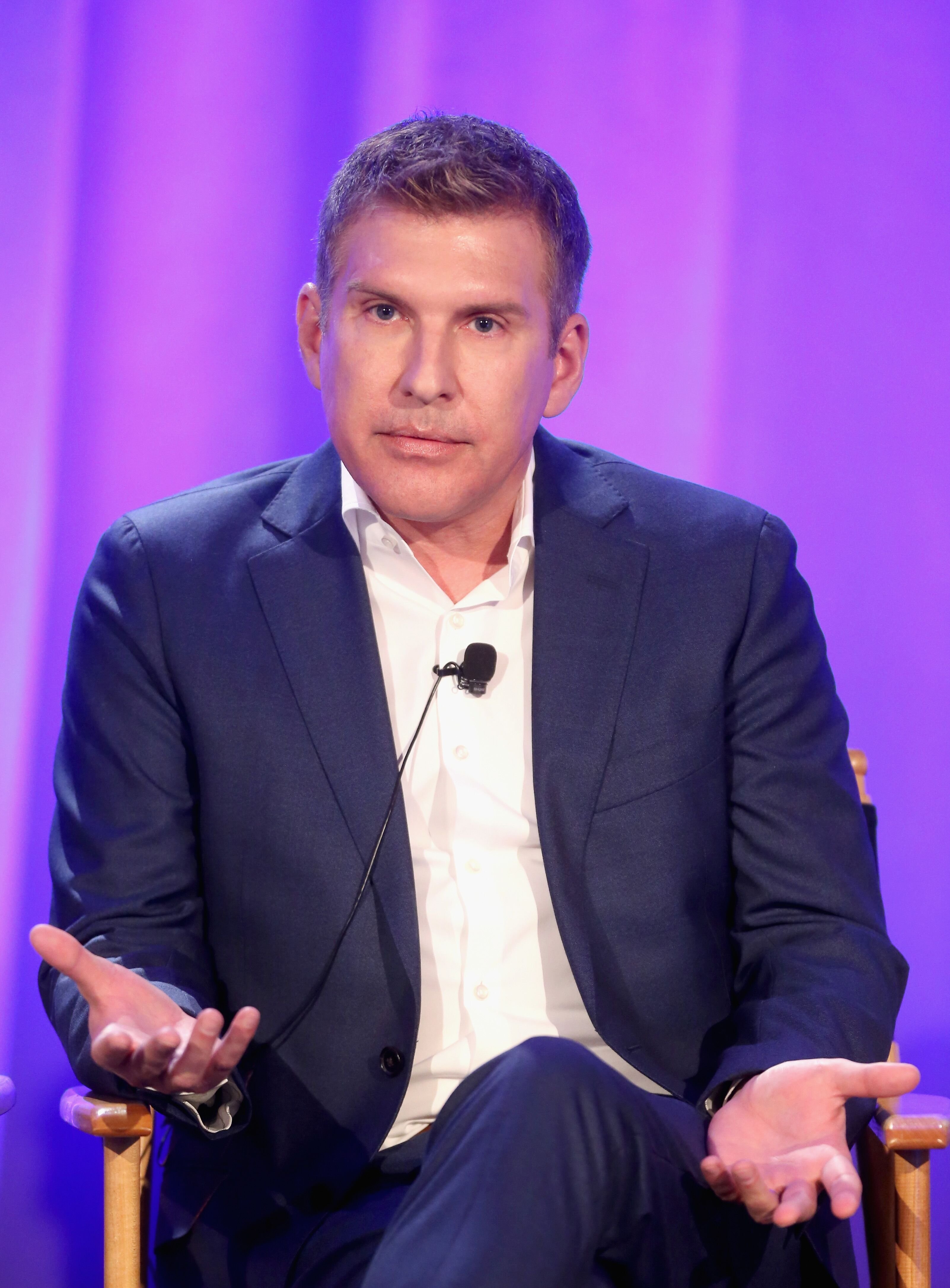 Todd Chrisley speaks before an audience. | Source: Getty Images