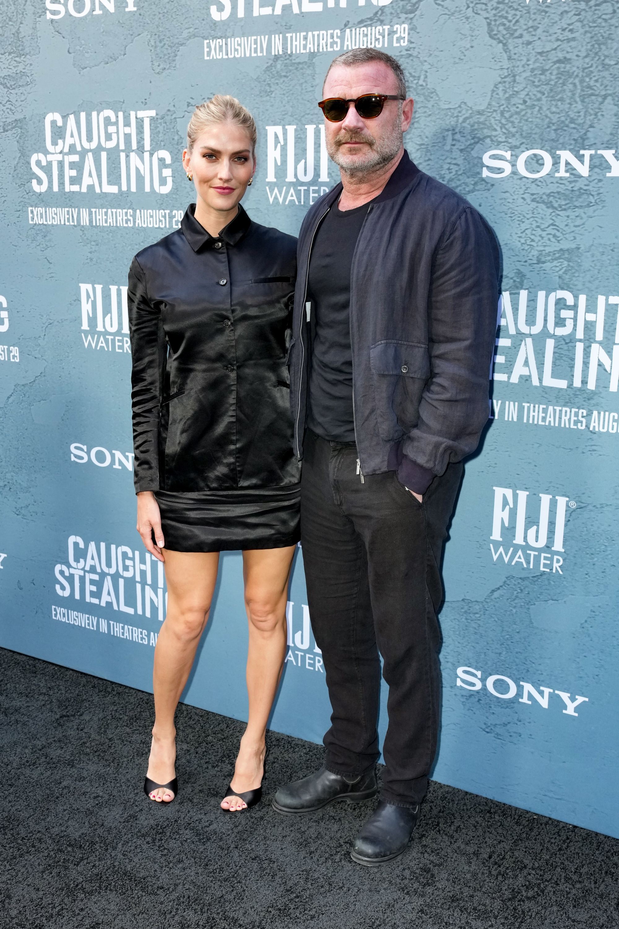 Taylor Neisen and Liev Schreiber at the Columbia Pictures "Caught Stealing" premiere held at Regal Union Square on August 26, 2025 in New York | Source: Getty Images