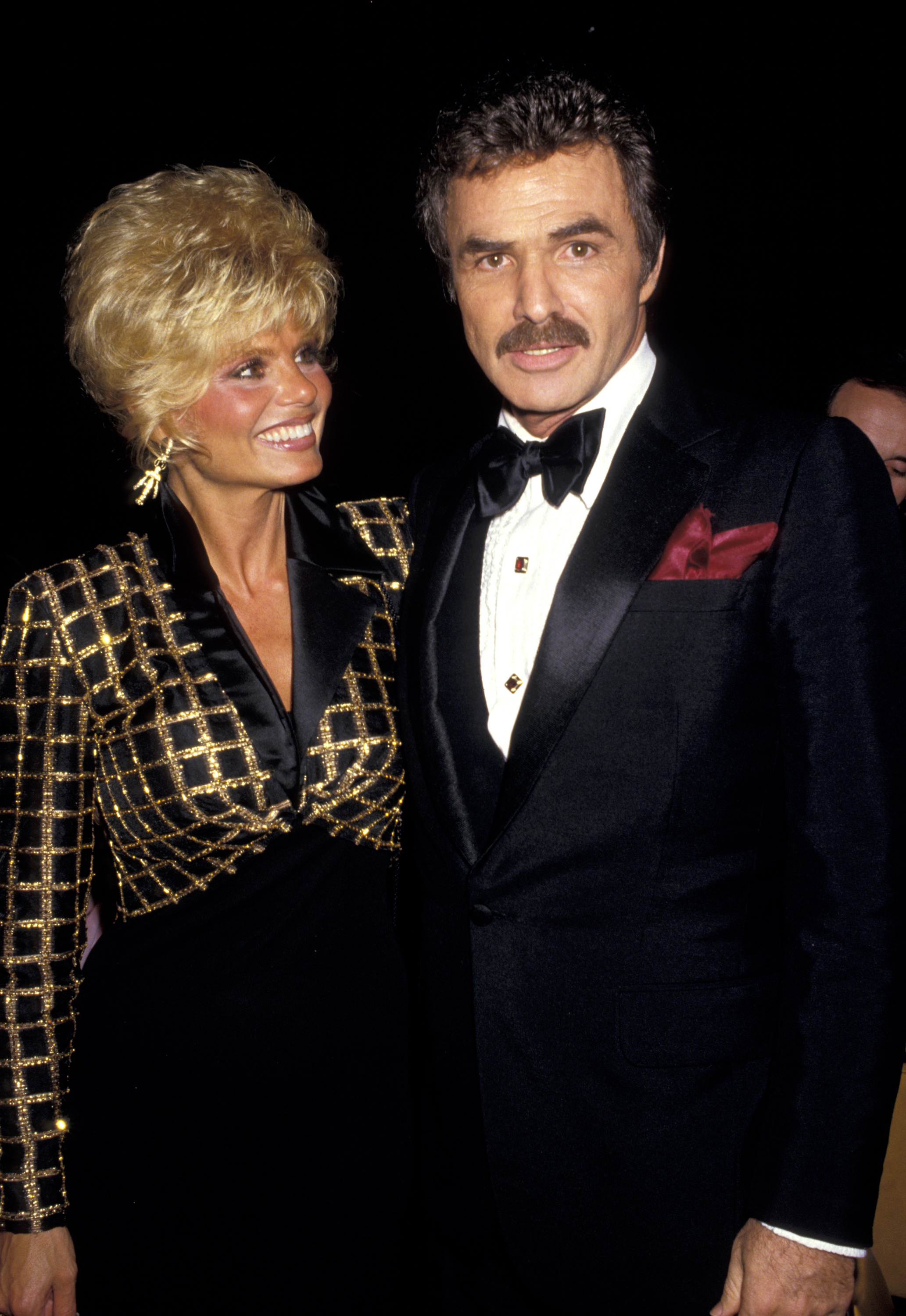 Loni Anderson and Burt Reynolds during Friars Club Tribute to Liza Minnelli on April 5, 1987, in Century City, California. | Source: Getty Images