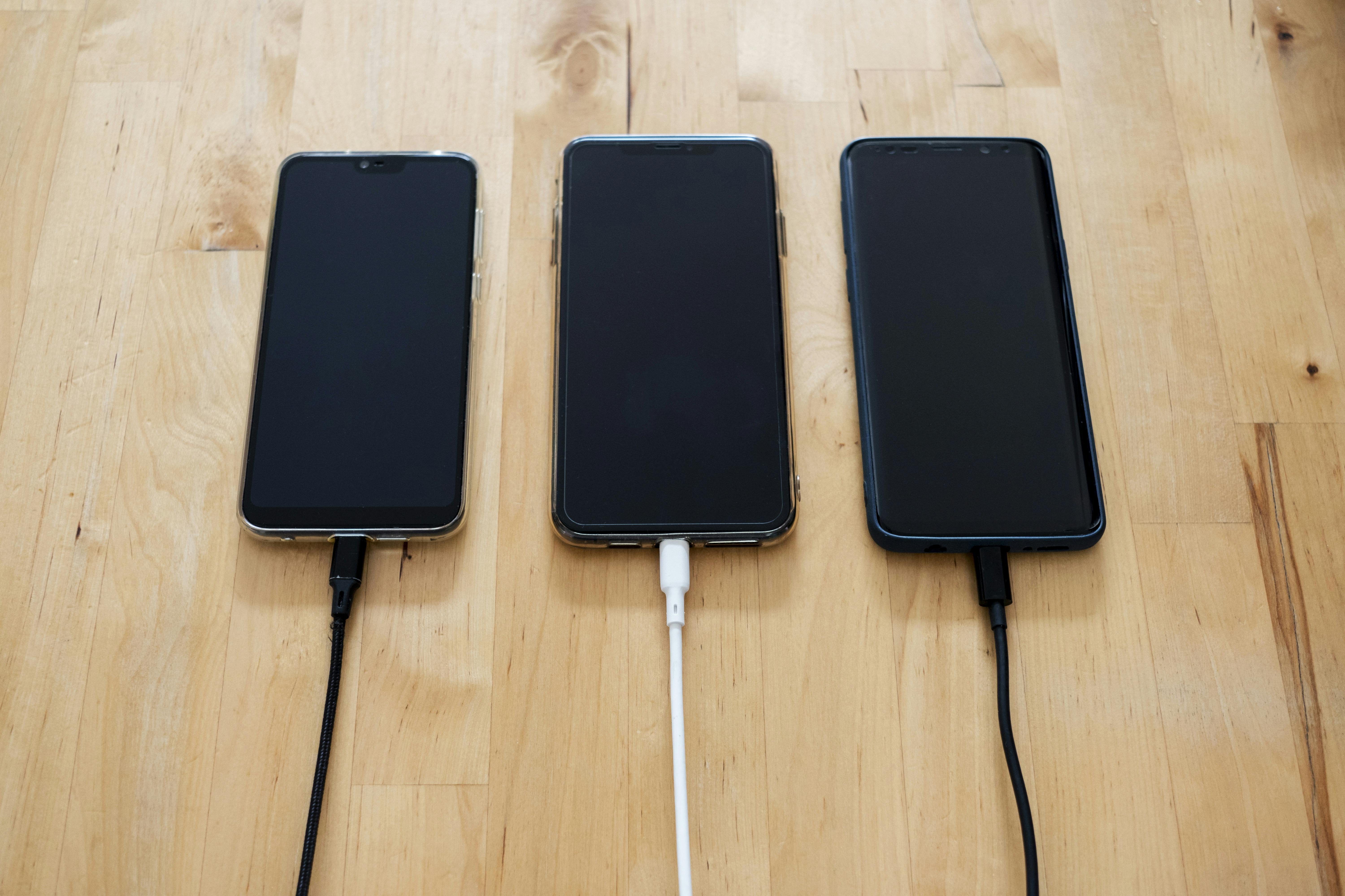 Phones charging simultaneously | Source: Pexels
