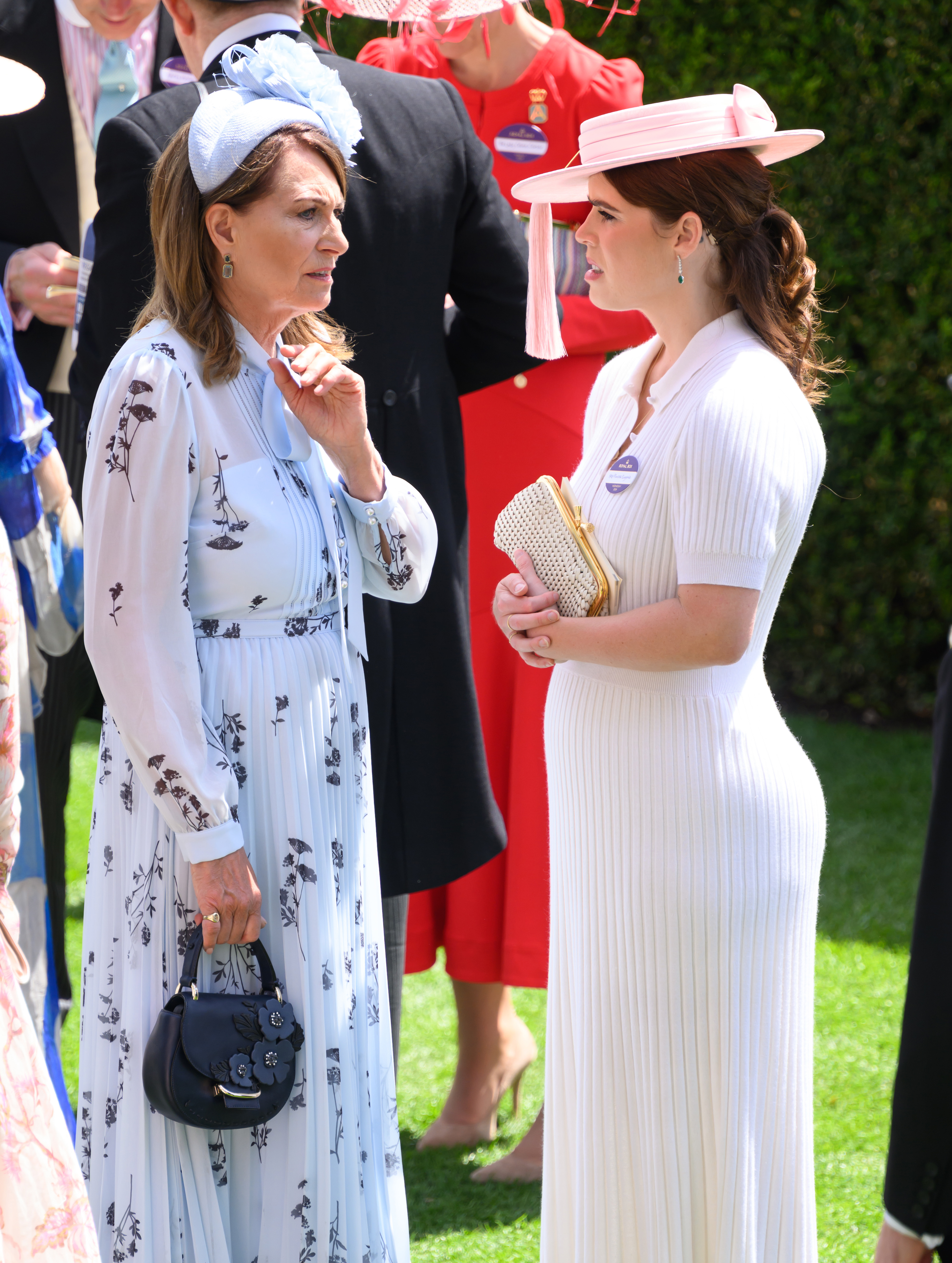 Carole Middleton speaking with Princess Eugenie at day 2 of the Royal Ascot in Ascot, England on June 19, 2024 | Source: Getty Images