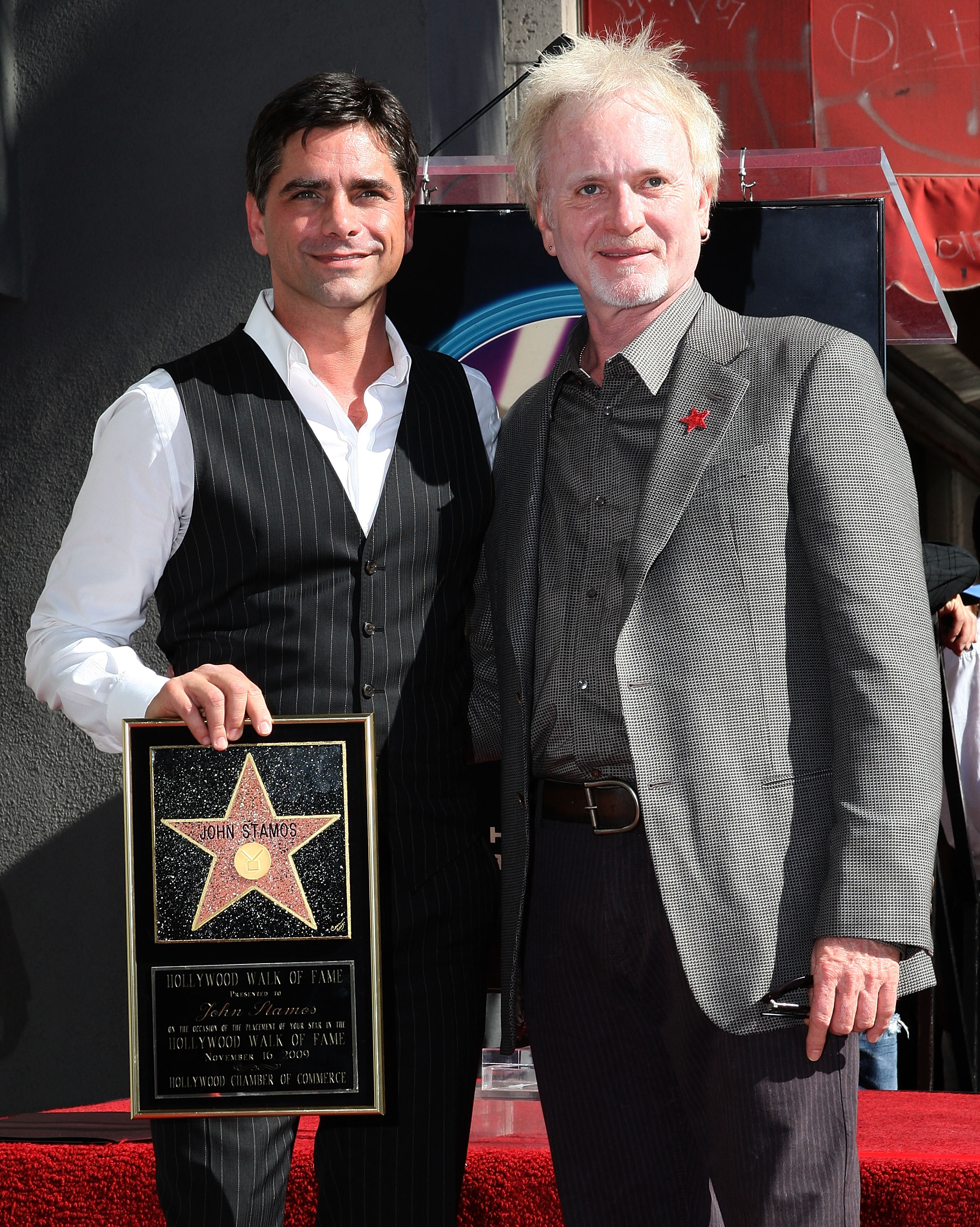 John Stamos and Anthony Geary at Stamos's Hollywood Walk of Fame induction ceremony on November 16, 2009 | Source: Getty Images