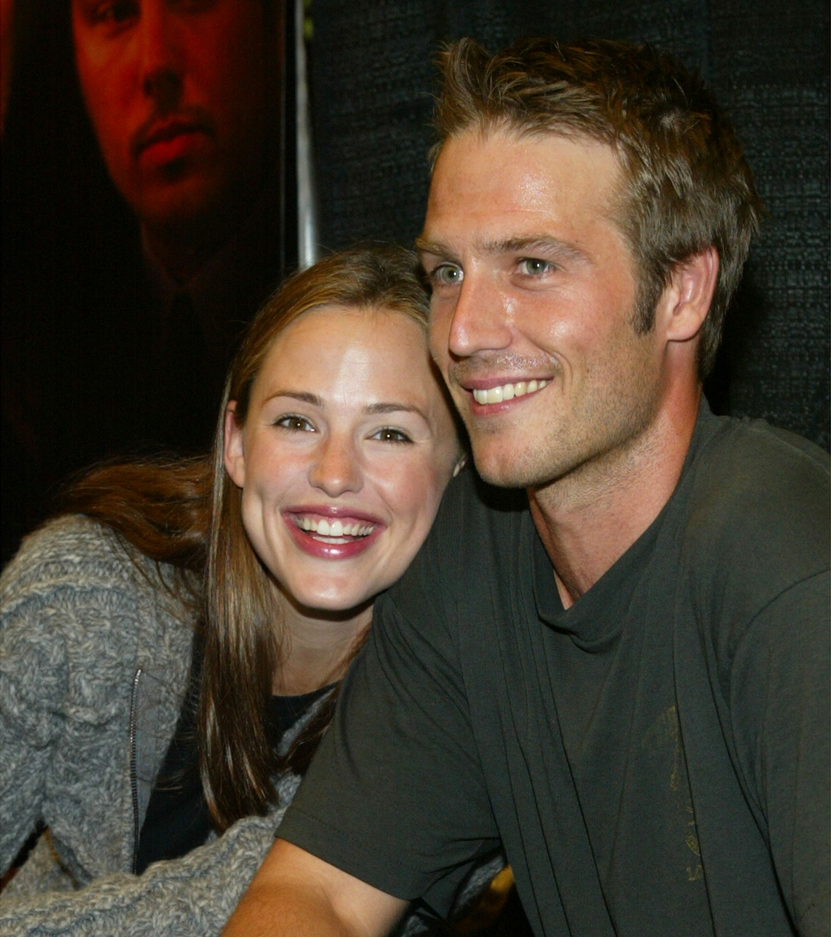 Michael Vartan and Jennifer Garner pose closely during a book signing for "Alias Declassified." Their off-screen friendship mirrored the connection fans loved between their characters.