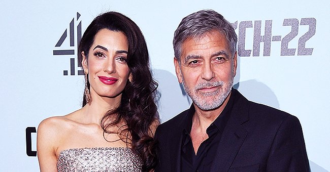 George y Amal Clooney posan para las cámaras durante un evento. | Foto: Getty Images